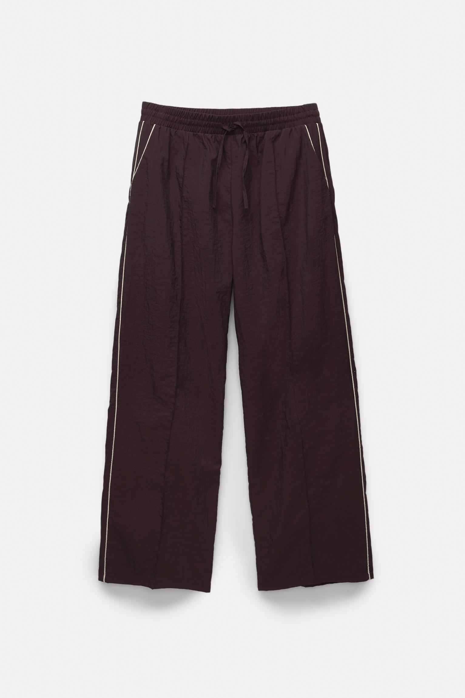 Tracksuit pants with side stripes Product Image