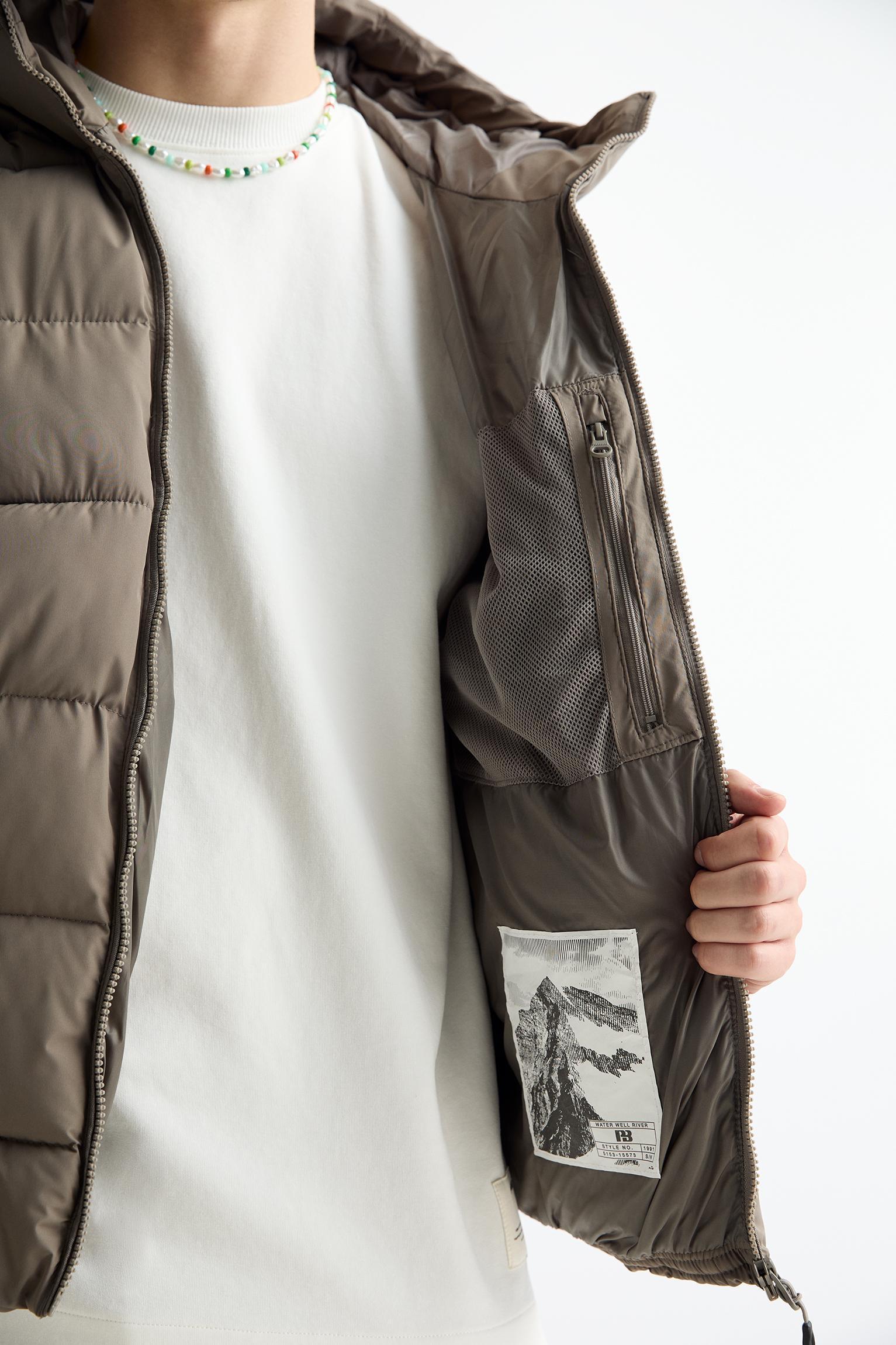 Lightweight puffer jacket with hood Product Image