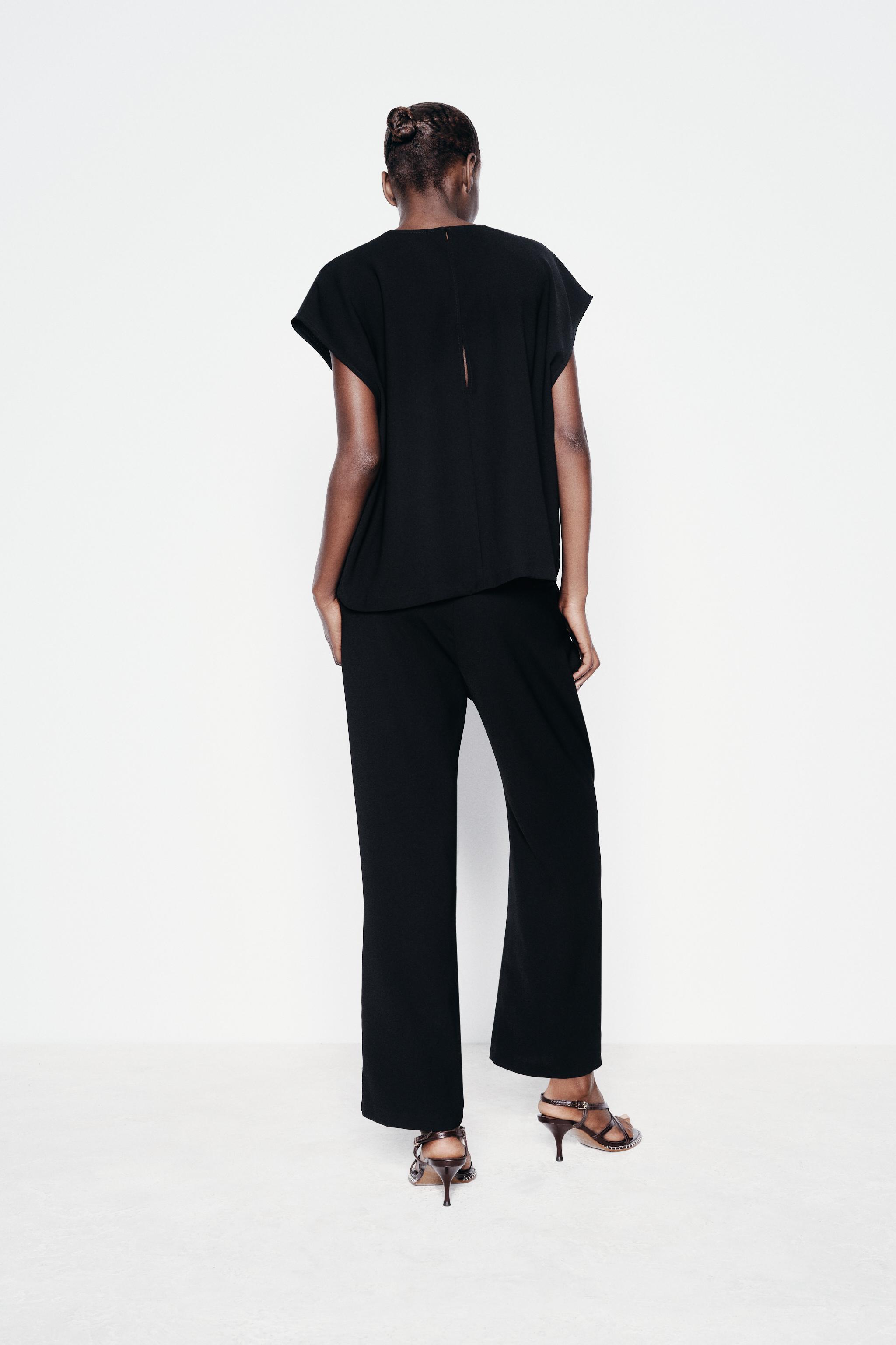 LONG BELTED JUMPSUIT Product Image