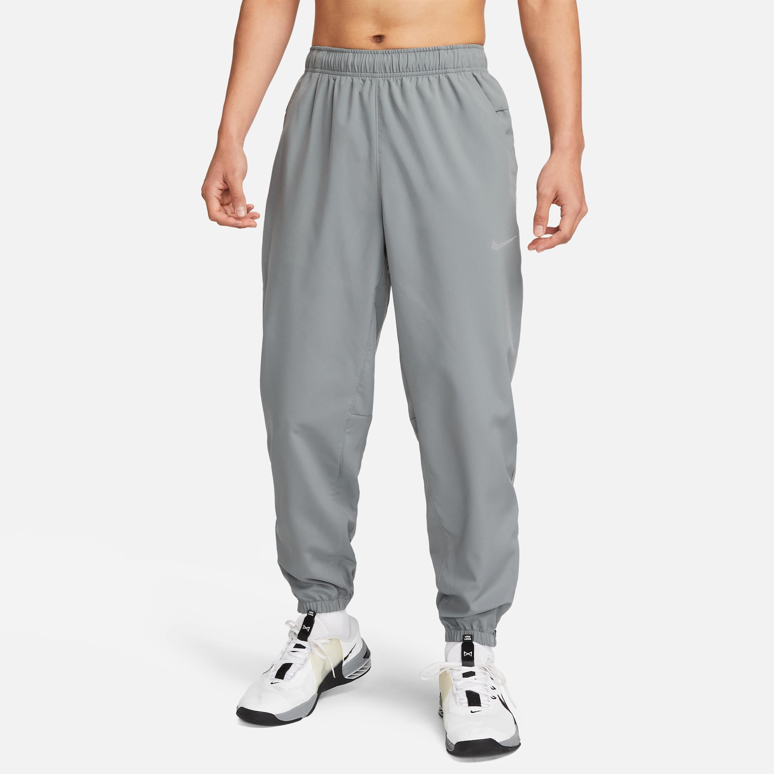Nike Mens Form Dri-FIT Tapered Versatile Pants | FB7497-084 Product Image