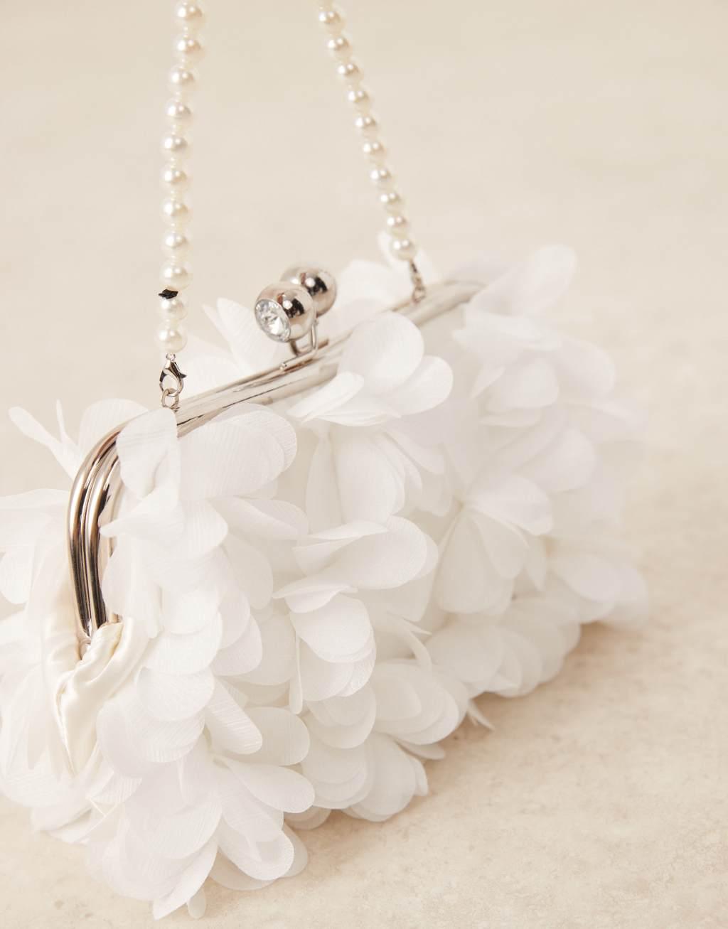 True Decadence floral clutch bag in white Product Image