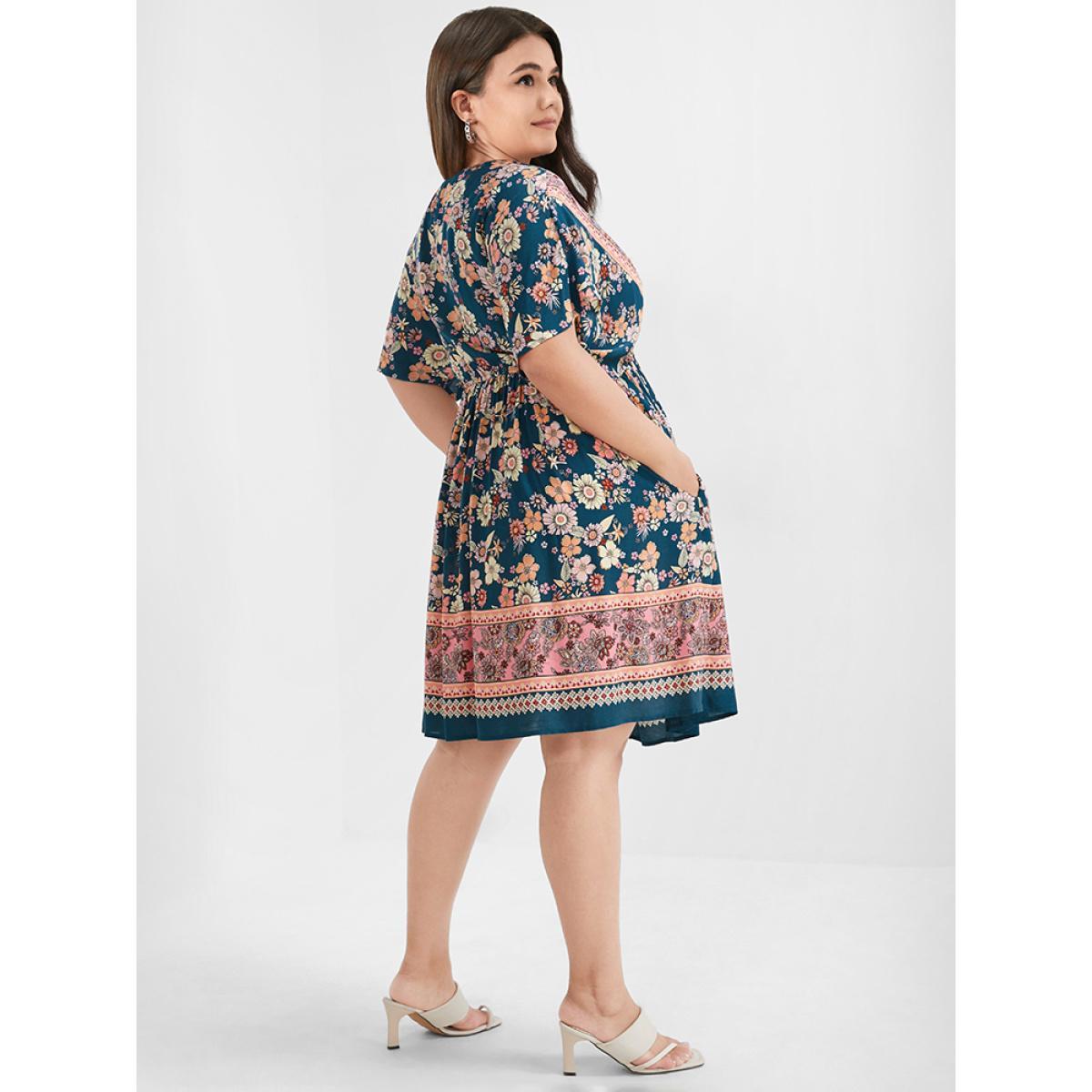 Plus Size Floral V Neck Elastic Waist Pocket Ruffles Knee Dress Indigo Women Vacation Printed V-neck Short sleeve Curvy Knee Dress BloomChic 14-16/1X Product Image
