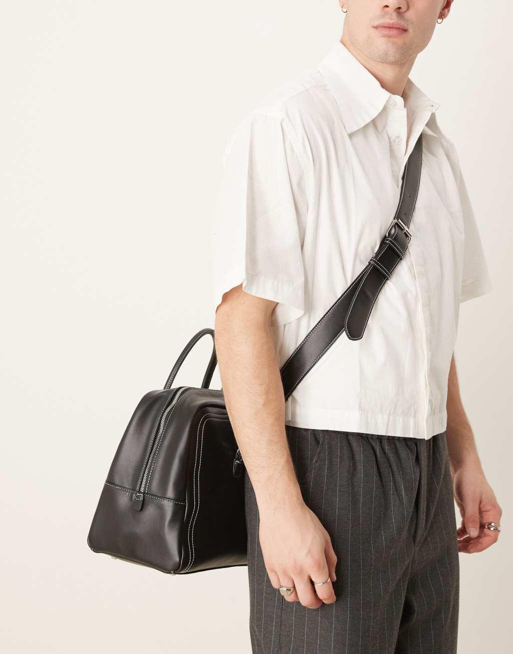 ASOS DESIGN faux leather holdall with contrast stitch in black Product Image