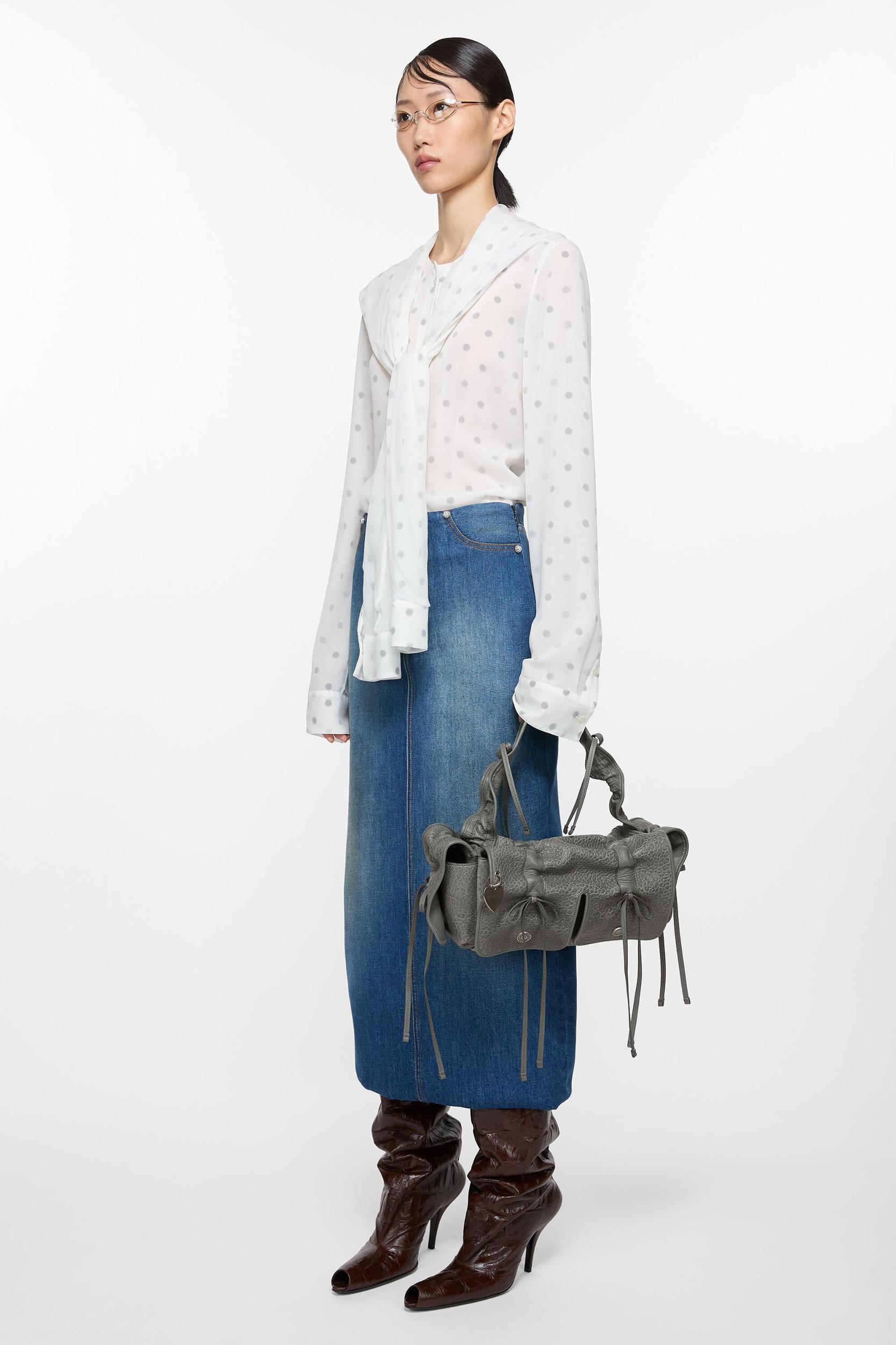 Multipocket grained leather bag Product Image