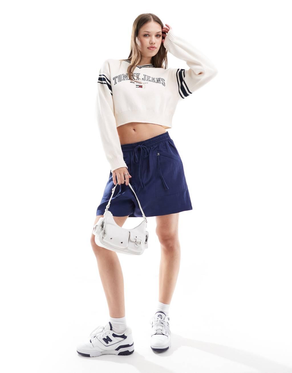 Tommy Jeans crop varsity v neck sweater in white Product Image