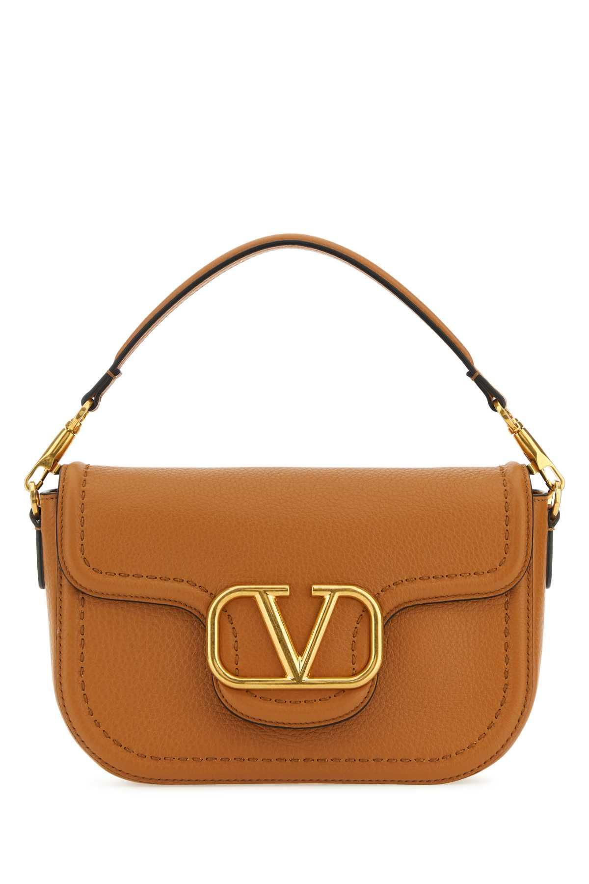 VALENTINO GARAVANI Hand Bags In Brown Product Image