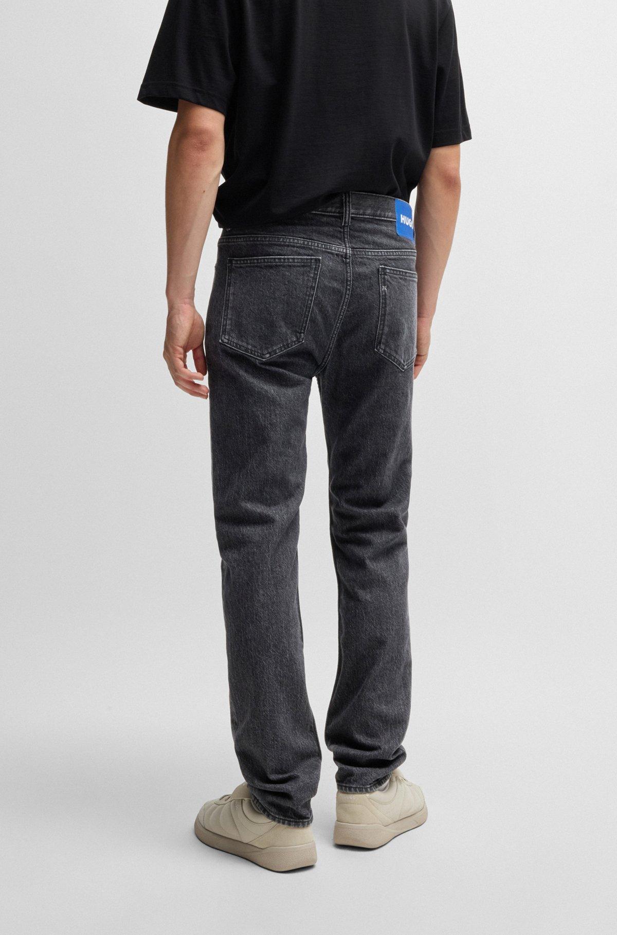 Slim-fit jeans in black stonewashed stretch denim Product Image