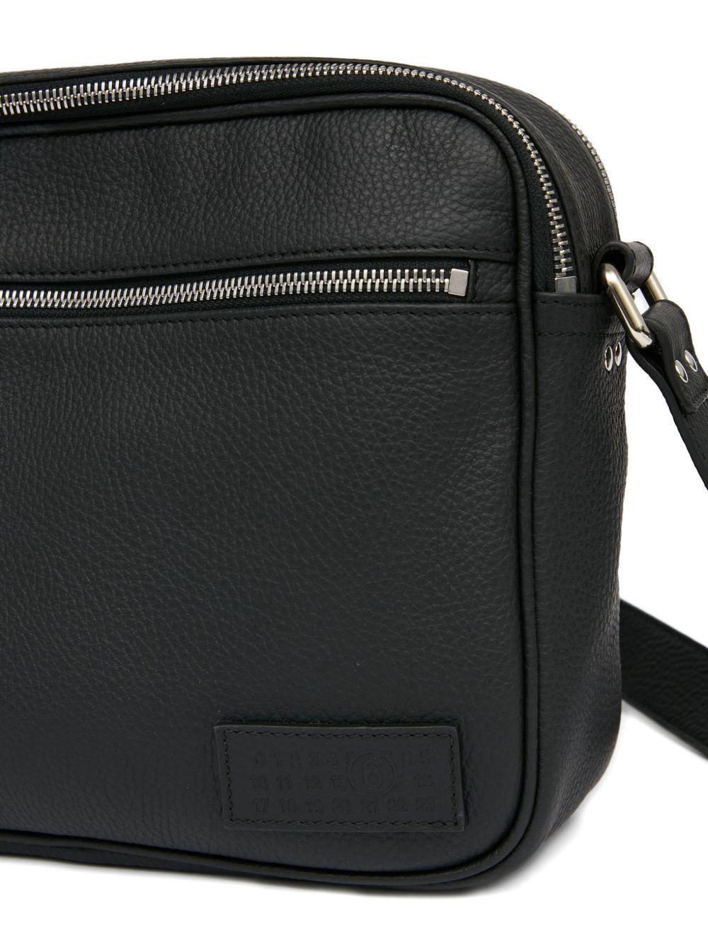 textured leather messenger bag Product Image