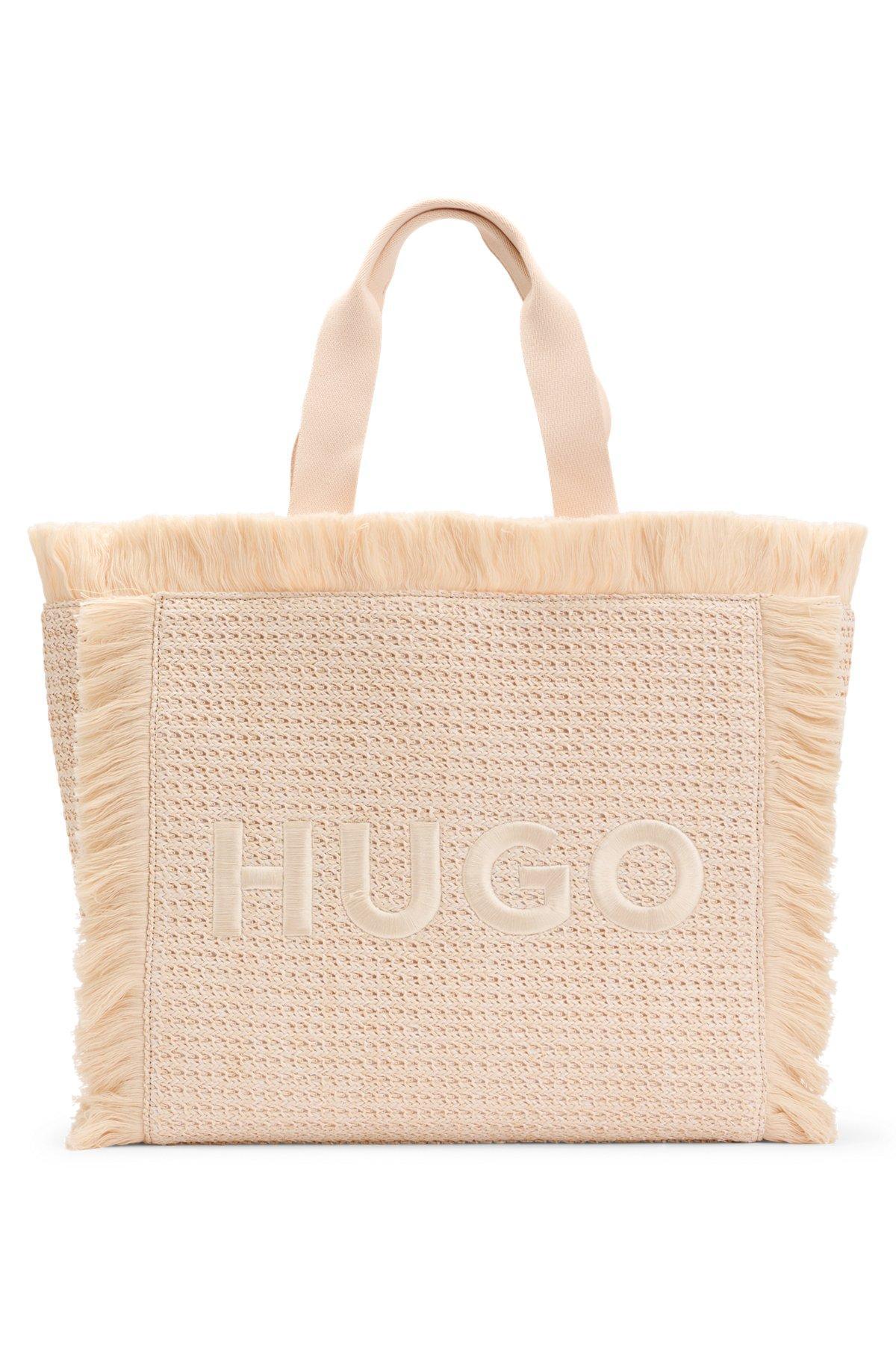 Logo-embroidered raffia-effect tote bag with fringe trims Product Image