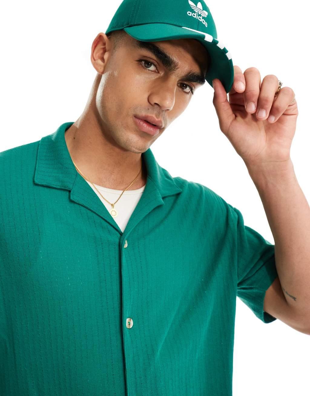 ASOS DESIGN oversized button up polo shirt in green Product Image