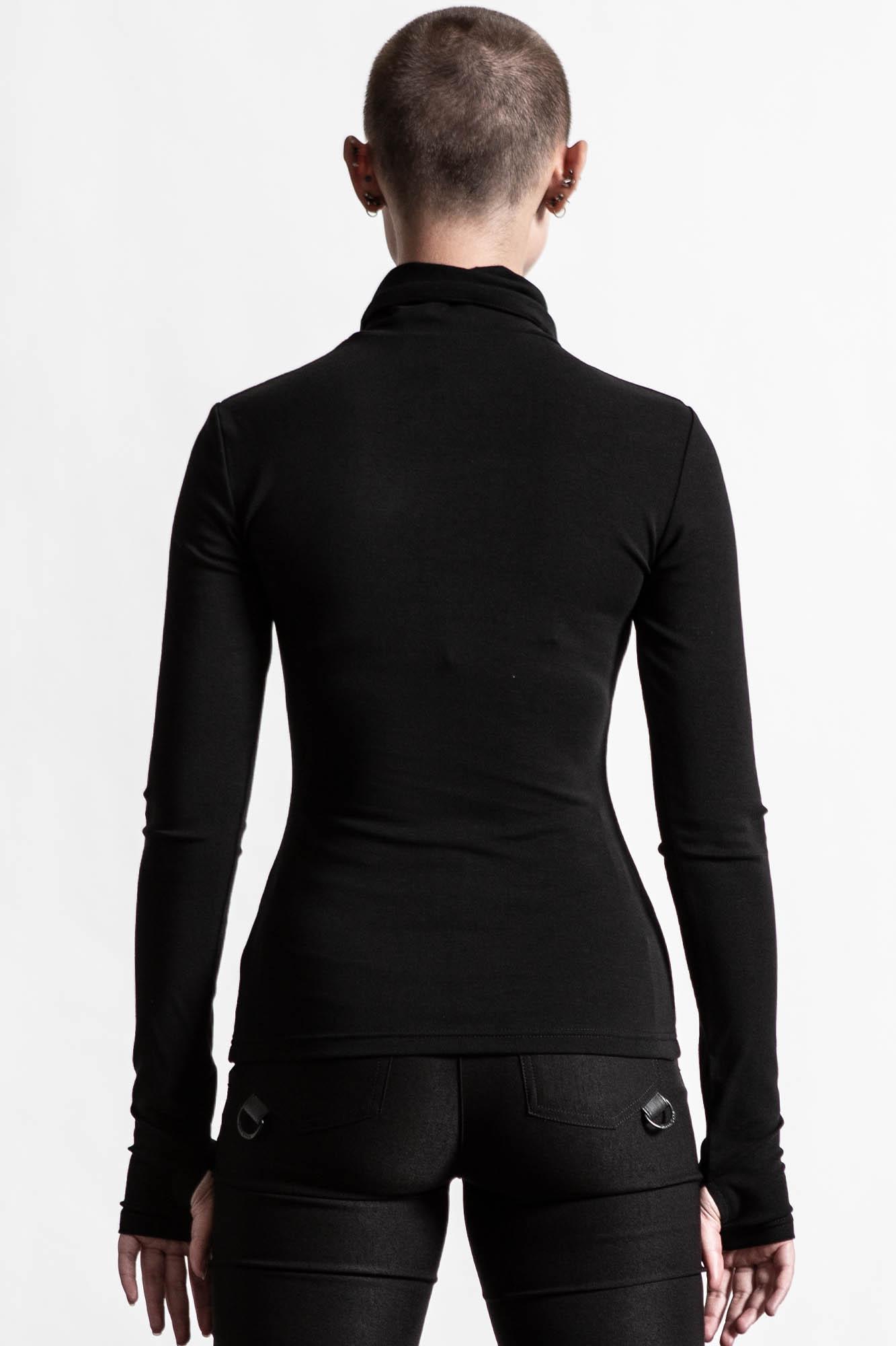 Sit & Spin Turtleneck Top Female Product Image