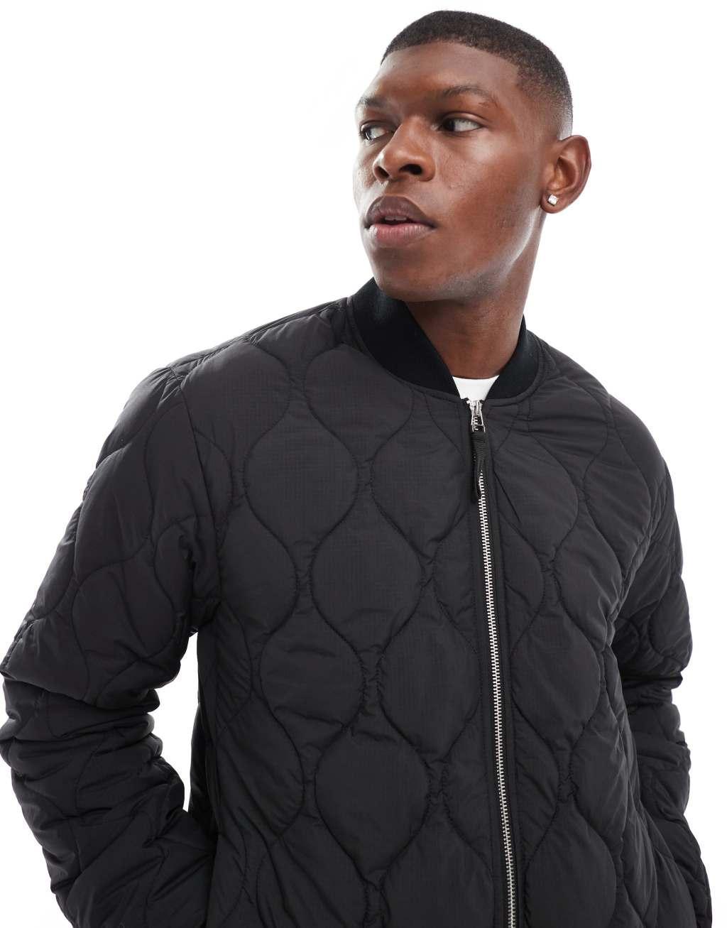 Jack & Jones quilted bomber jacket in black  Product Image