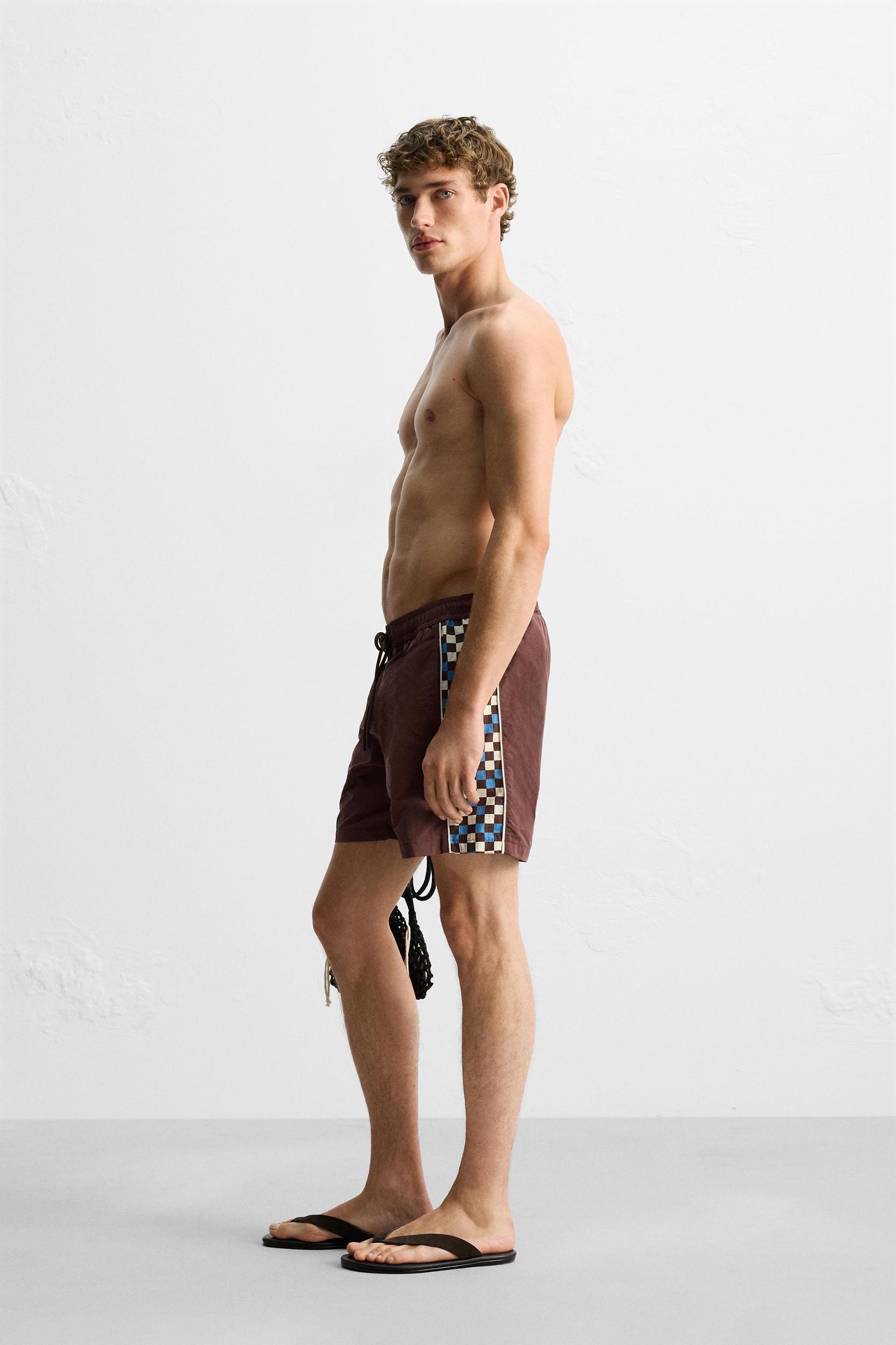 LONG SWIMSUIT WITH CONTRAST STRIPE Product Image