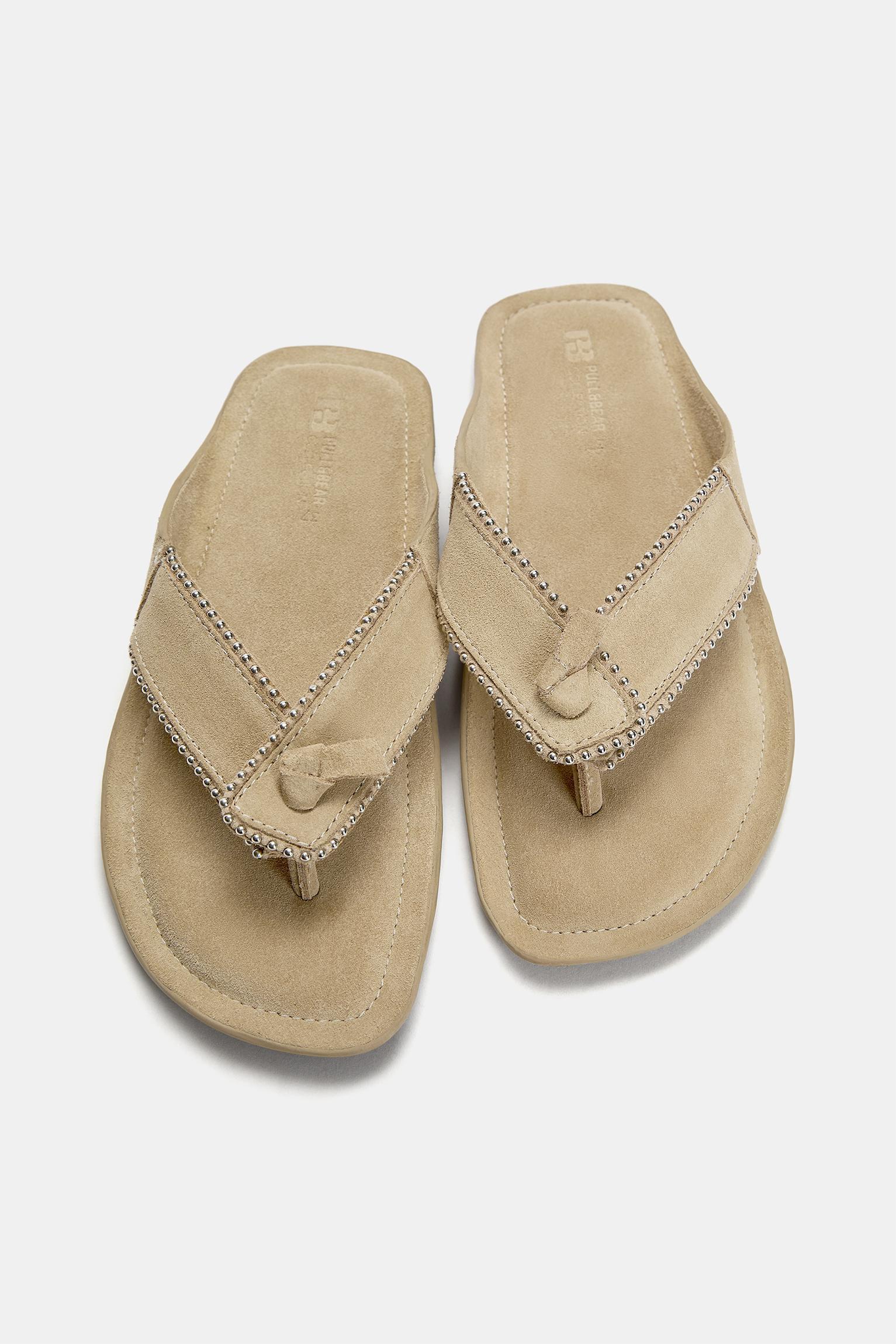 Flat sandals with leather embellishments Product Image