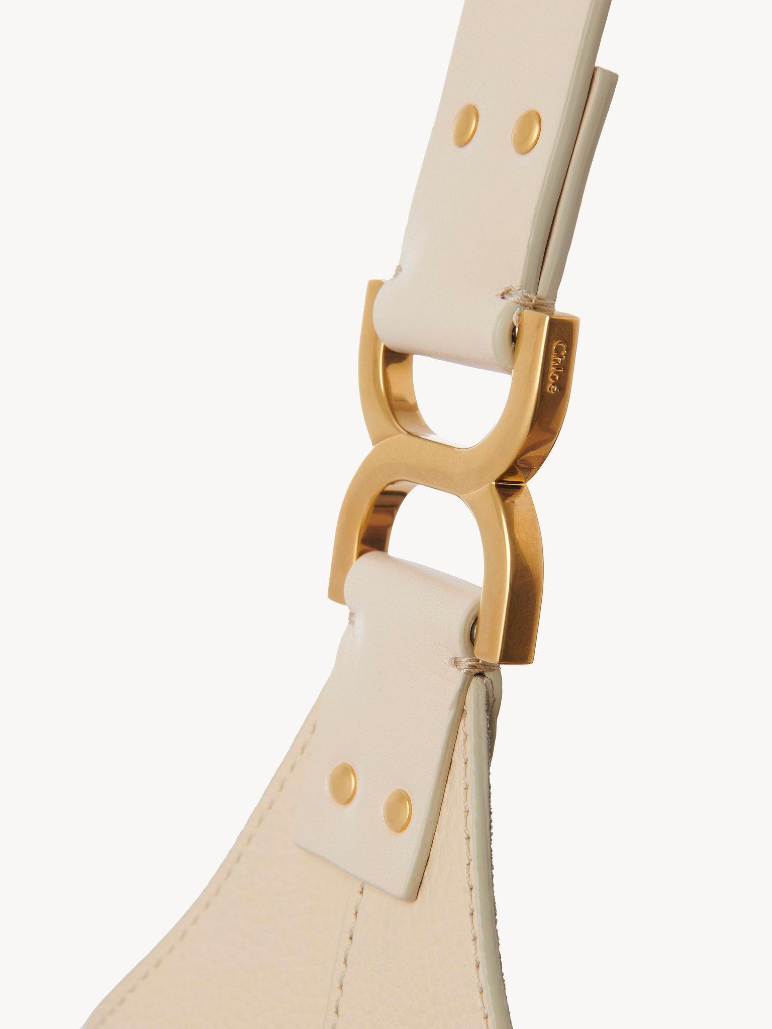 Small Marcie hobo bag in grained leather Product Image