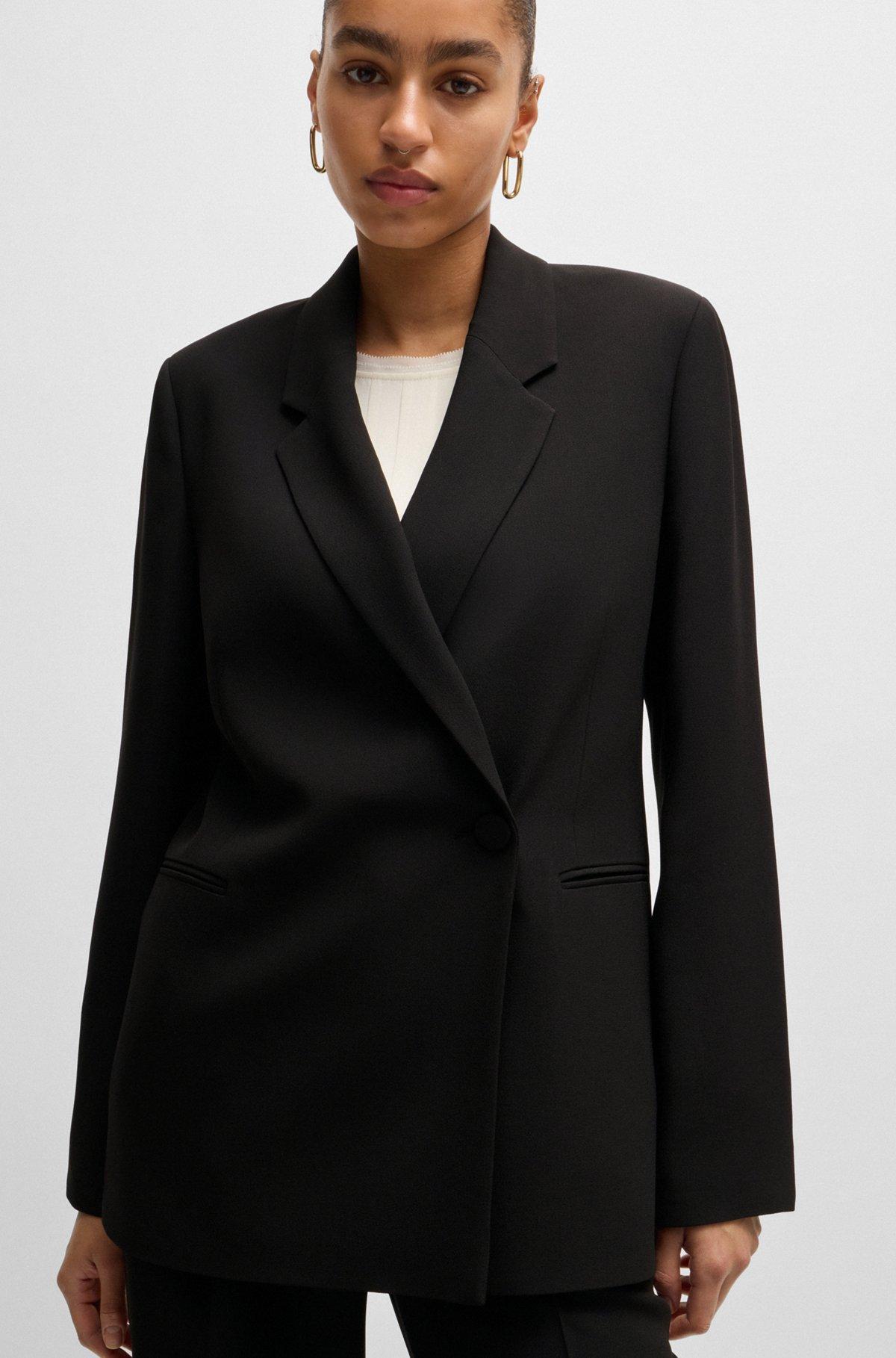 Relaxed-fit jacket with feature button Product Image