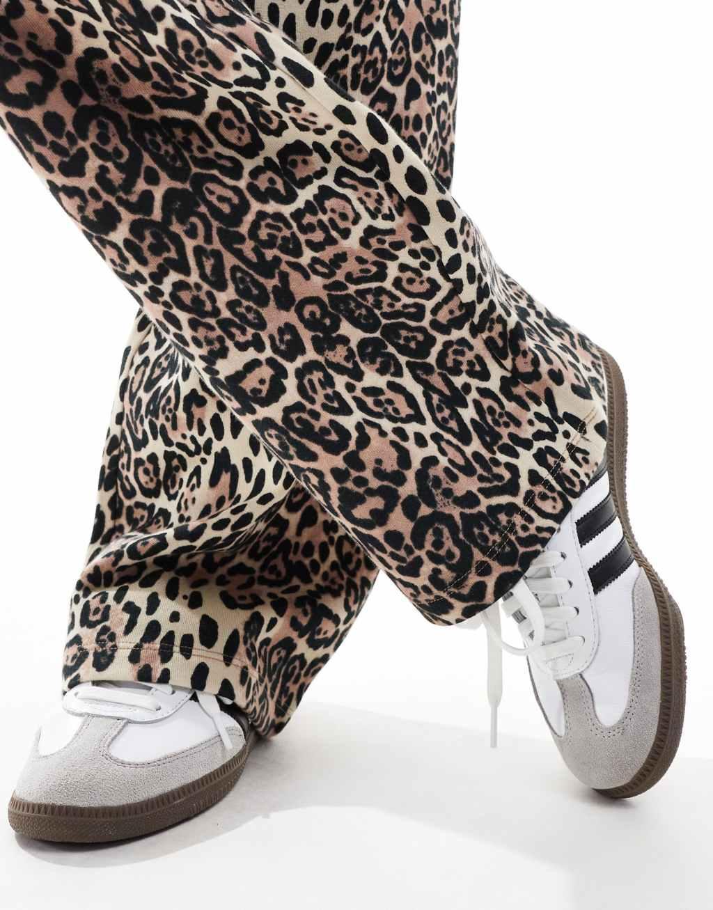 ASOS DESIGN straight leg sweatpants in leopard print Product Image