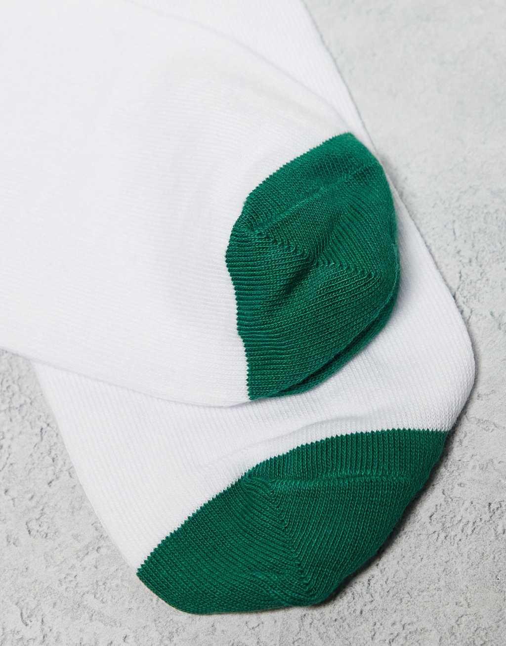 ASOS DESIGN Christmas dinosaur tree socks in white Product Image