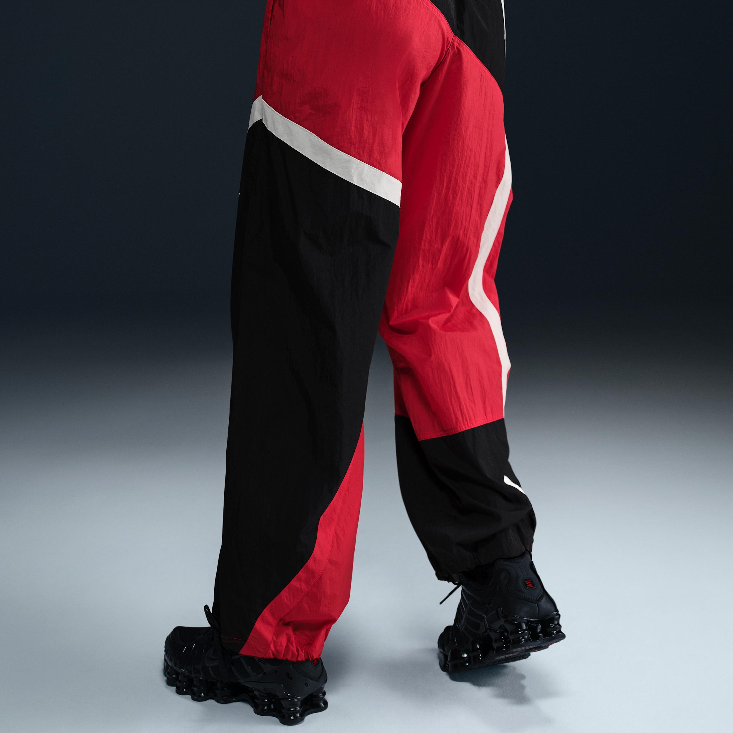 Nike Sportswear Women's Mid-Rise Loose Woven Open-Hem Pants Product Image