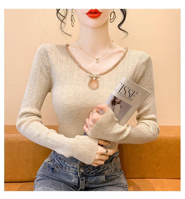 Long Sleeve V-Neck Beaded Keyhole Ribbed Knit Top Product Image