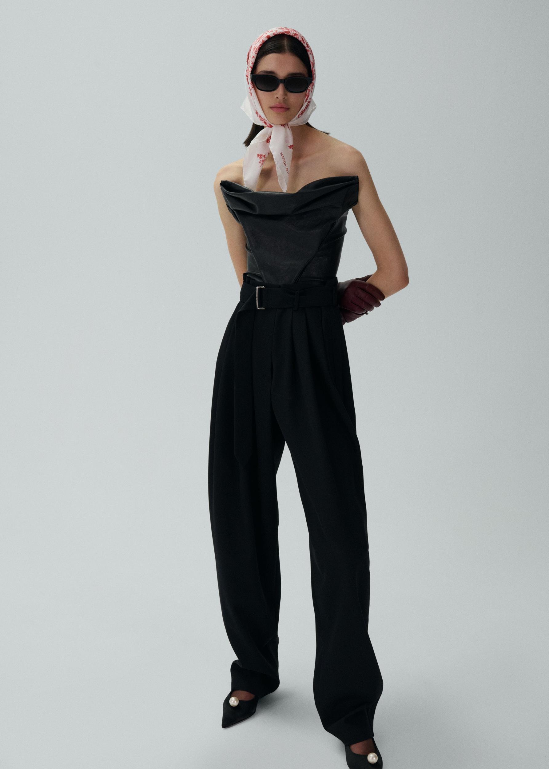 Wide belted tapered trousers in black Product Image