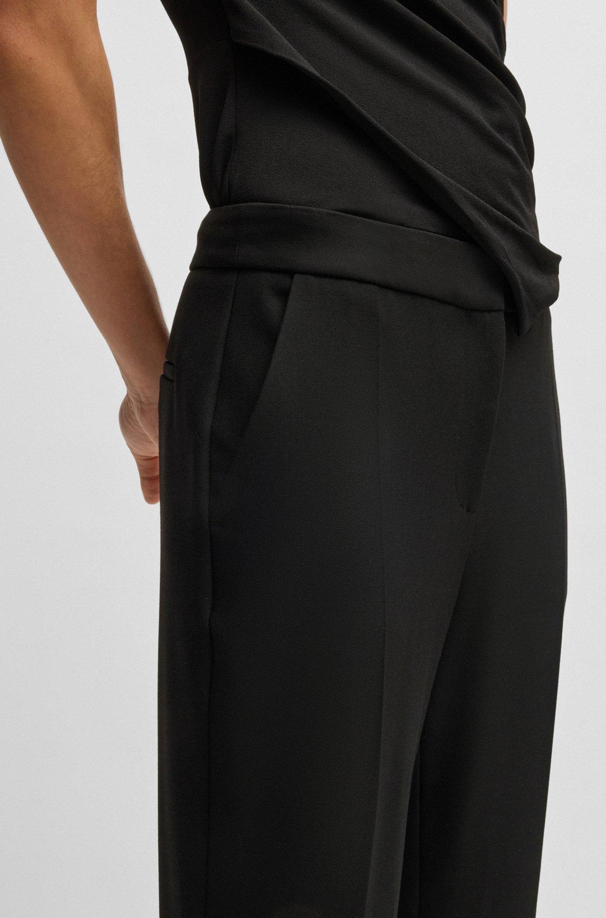 Slim-fit trousers with bootcut leg Product Image
