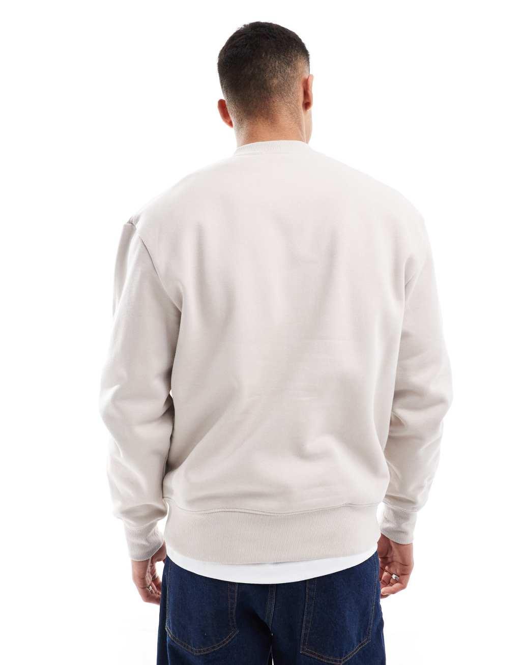 ASOS DESIGN premium heavyweight oversized sweatshirt in light beige Product Image