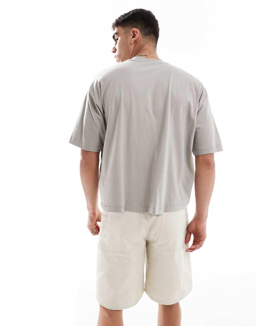 ASOS DESIGN boxy oversized T-shirt with text graphics in khaki Product Image