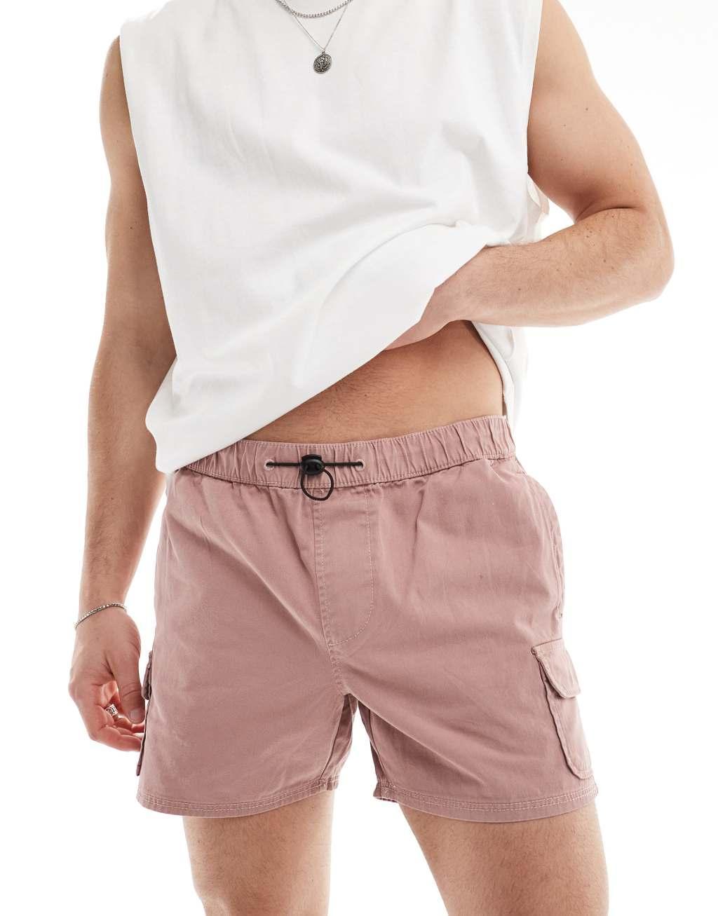 ASOS DESIGN slim cargo shorts in pink Product Image