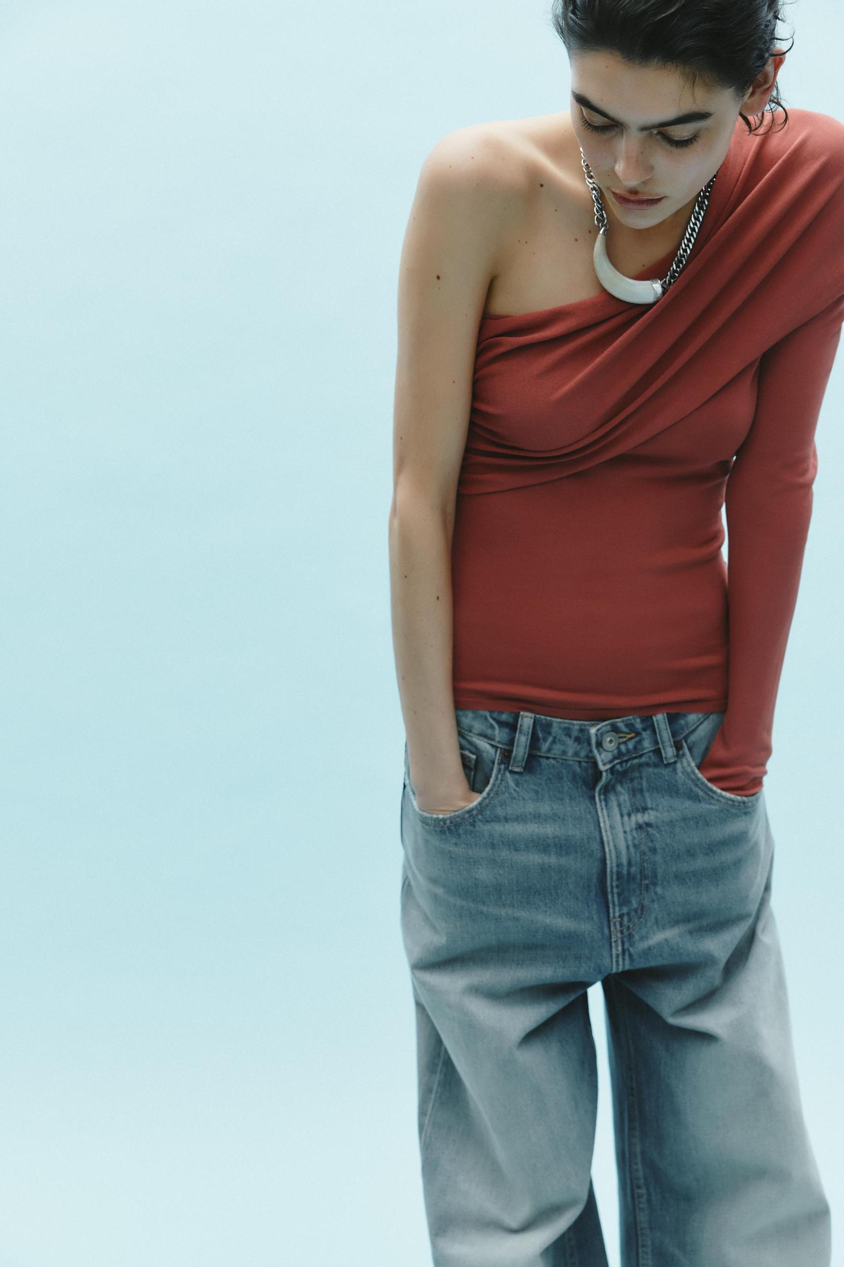 DRAPED KNIT ASYMMETRIC TOP Product Image