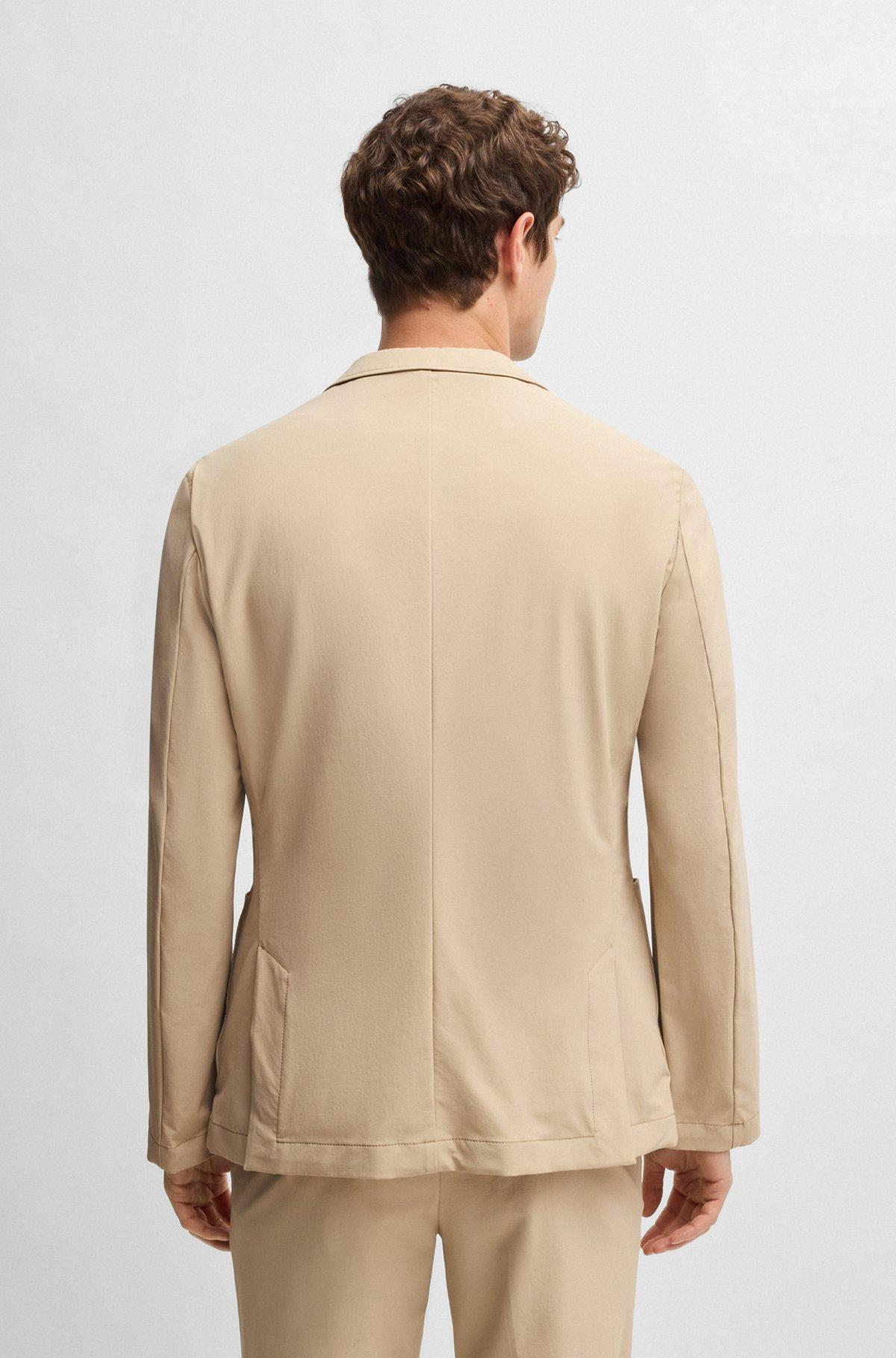 Slim-fit suit jacket in travel-friendly stretch softshell Product Image