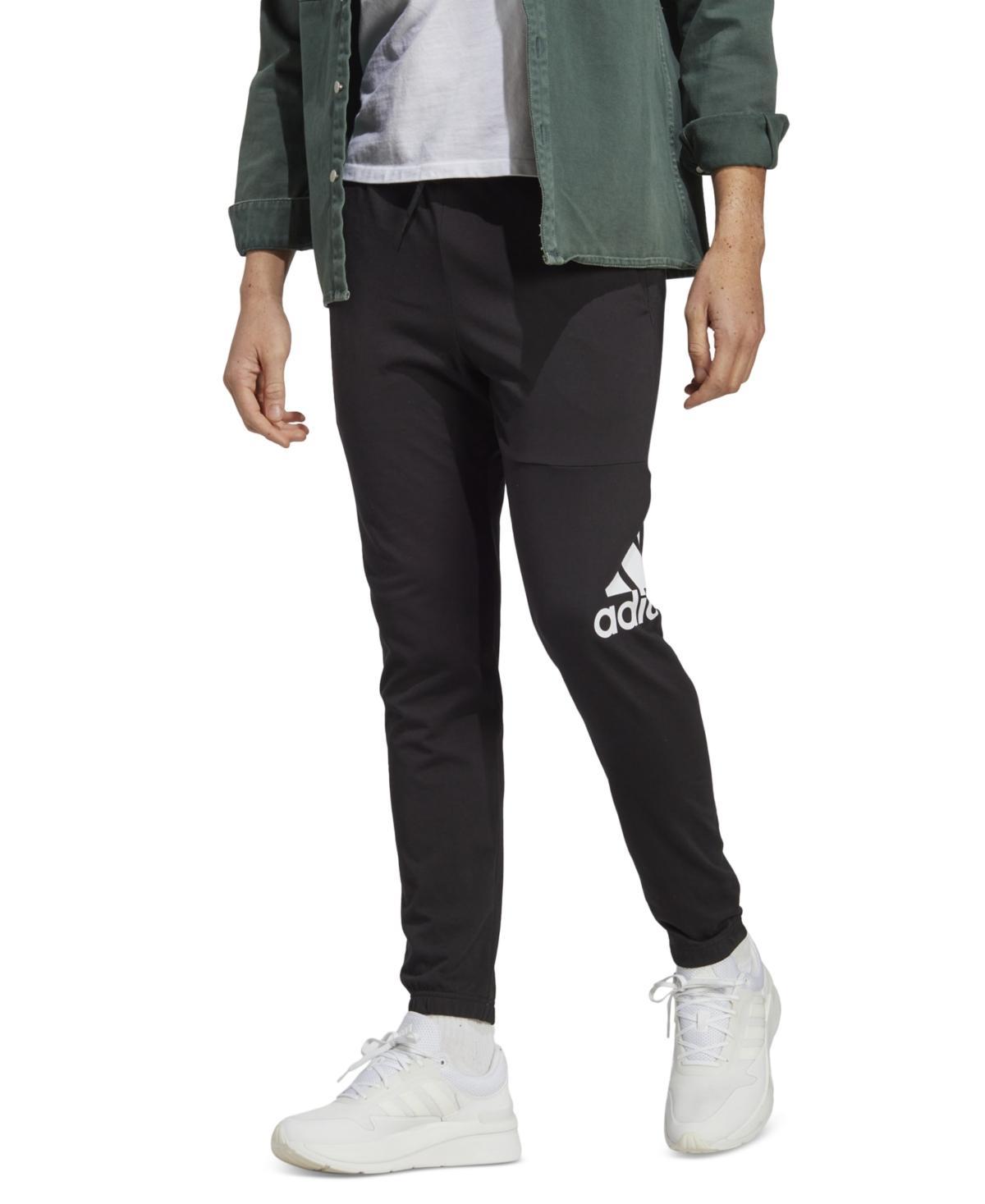 adidas Essentials Single Jersey Tapered Badge Of Sport Pants (Ink) Men's Clothing Product Image