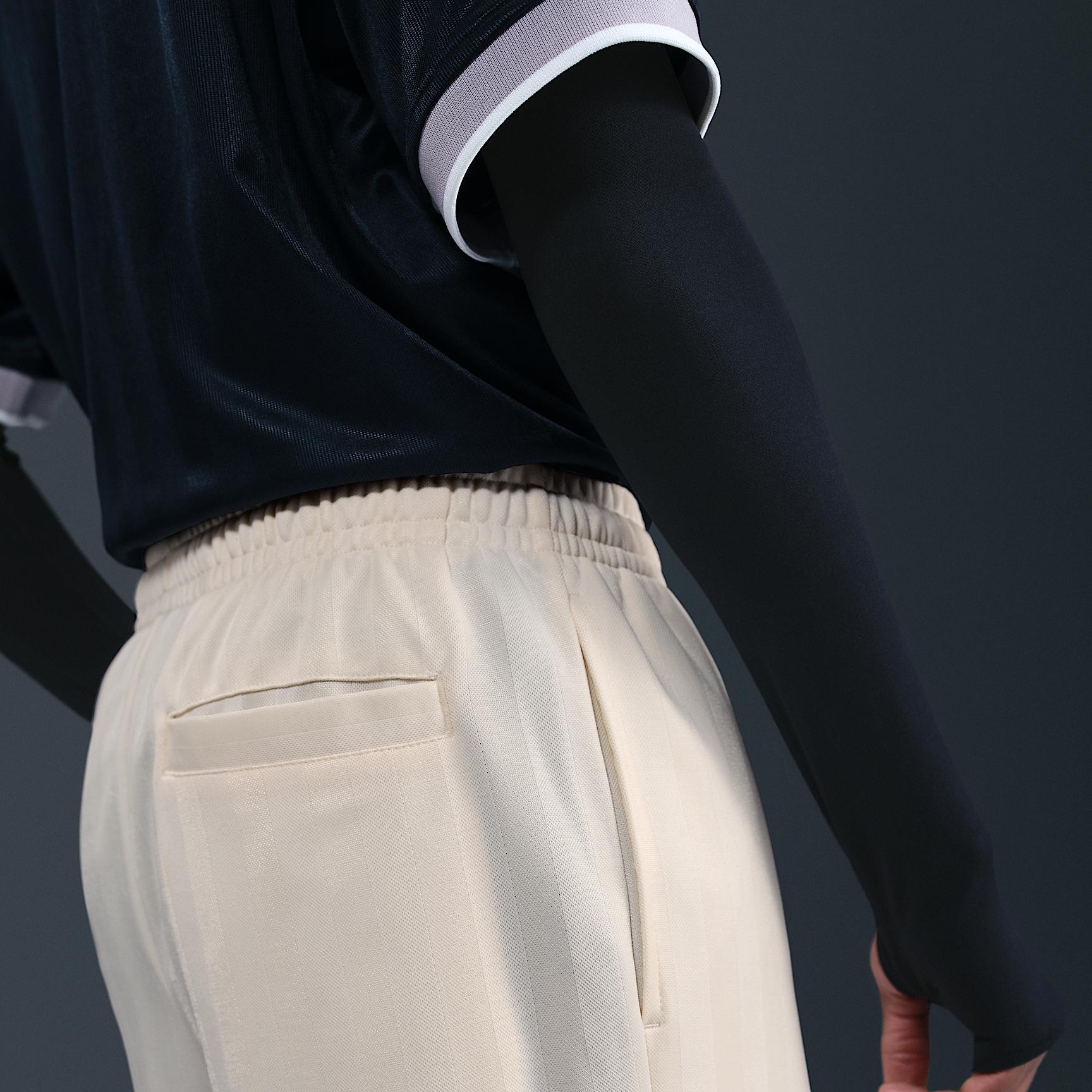 Womens Nike Sportswear Mid-Rise Loose Jacquard Striped Track Pants | HV5133-110 Product Image