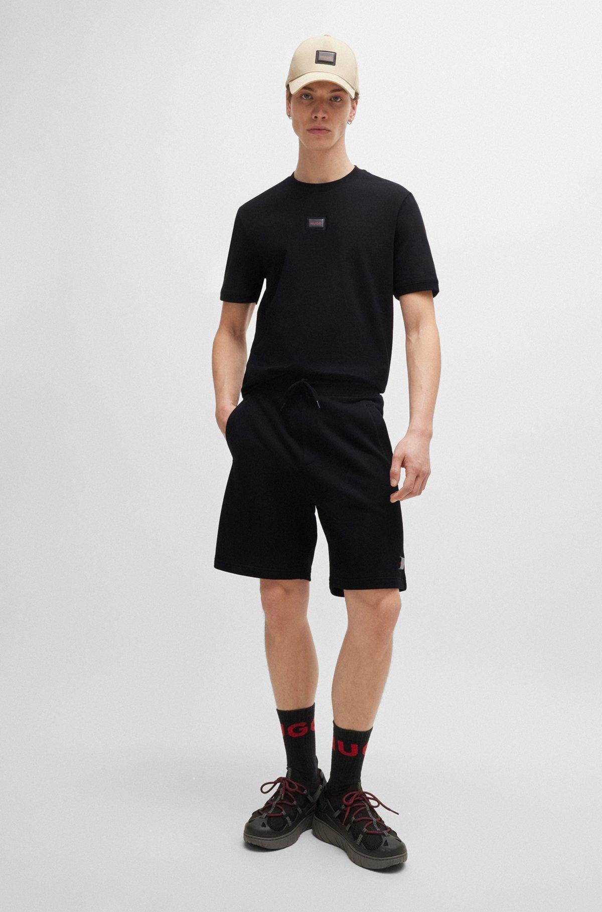 Cotton-terry relaxed-fit shorts with logo trim Product Image