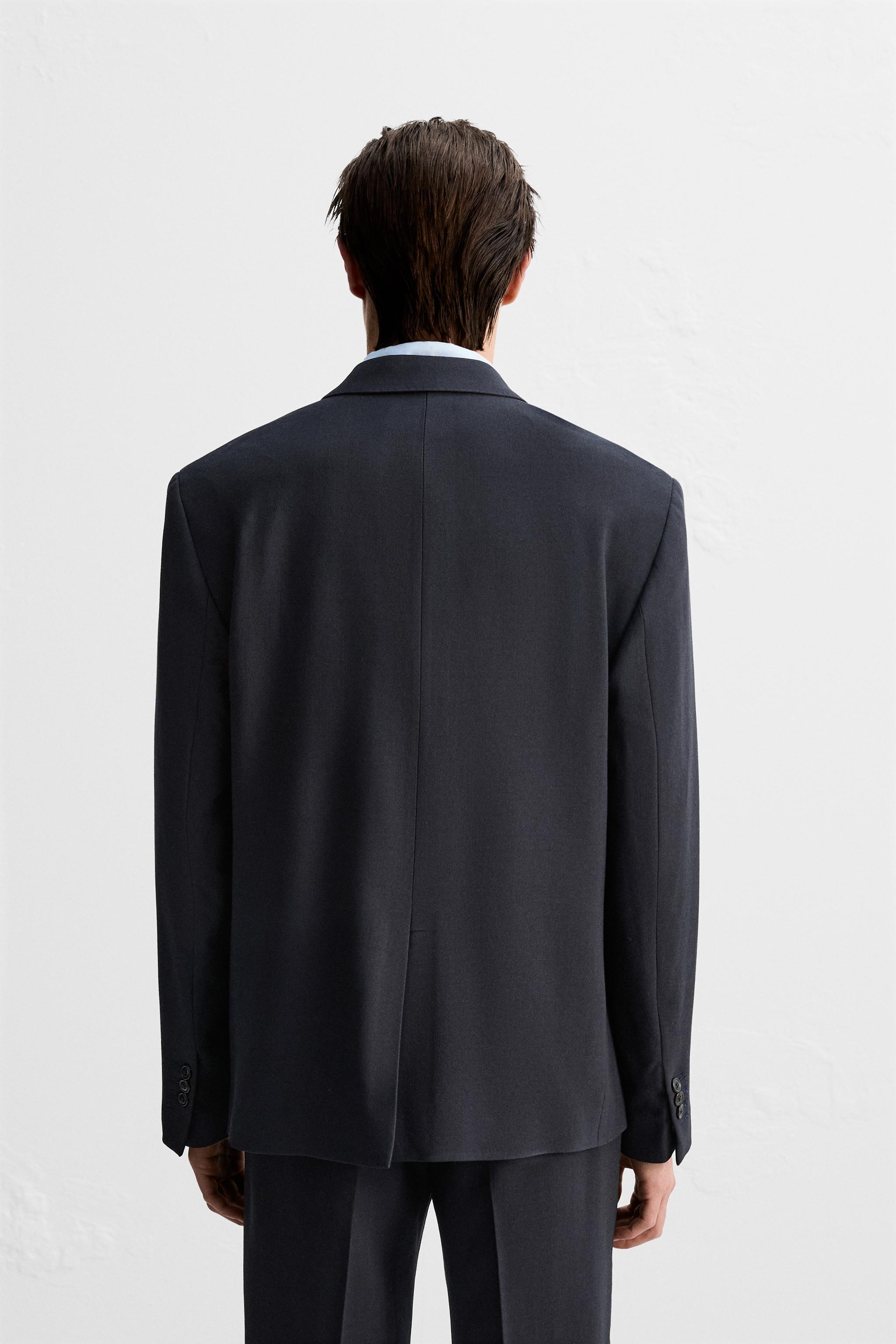 DOUBLE BREASTED HERRINGBONE SUIT JACKET Product Image