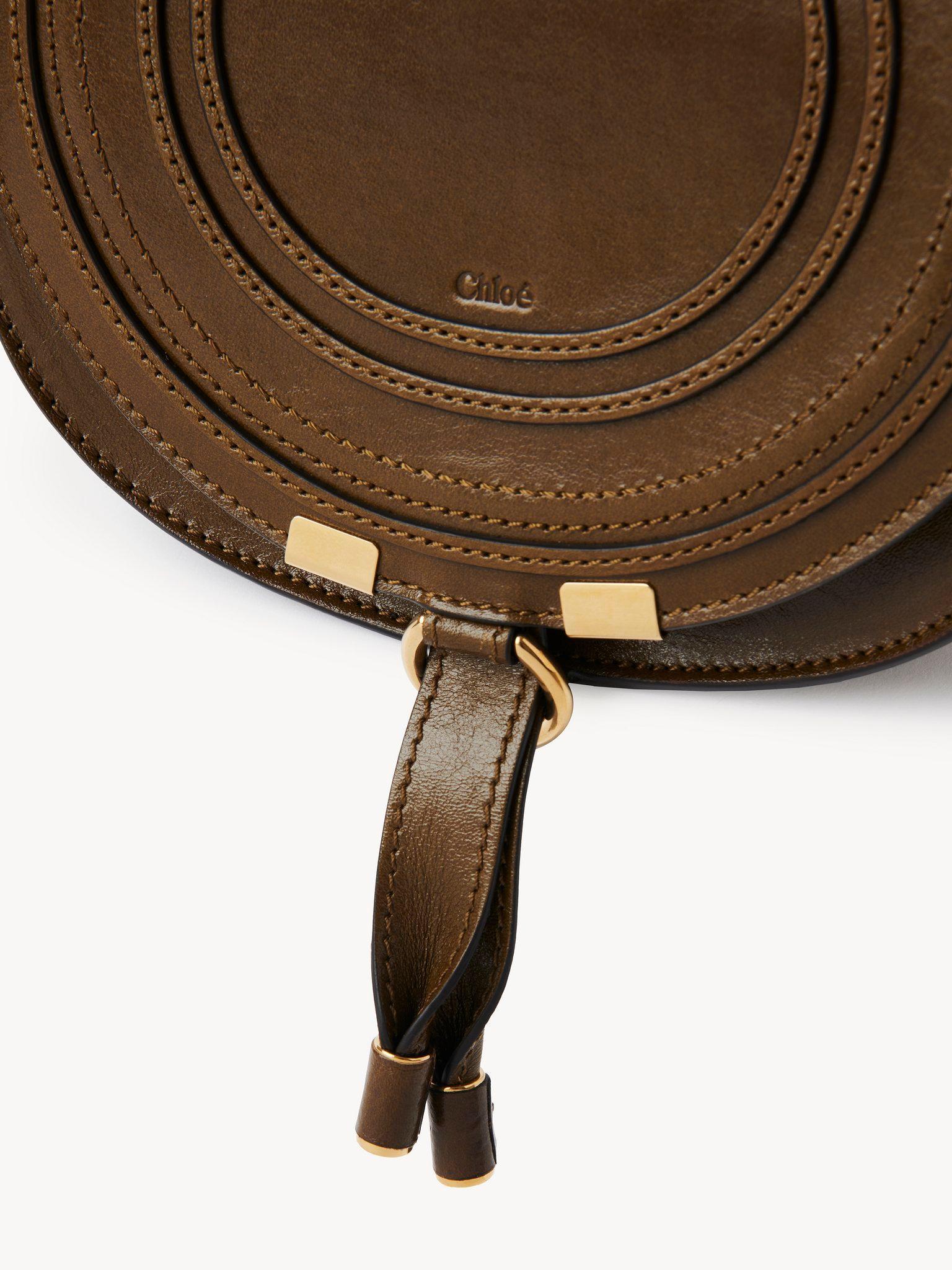 Small Marcie saddle bag in shiny leather Product Image