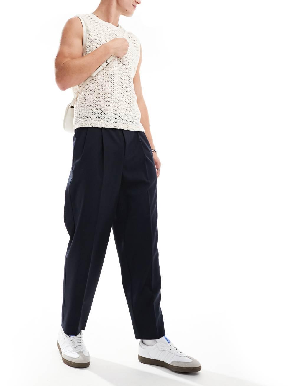 ASOS DESIGN oversized tapered dress pants with double pleat in navy Product Image