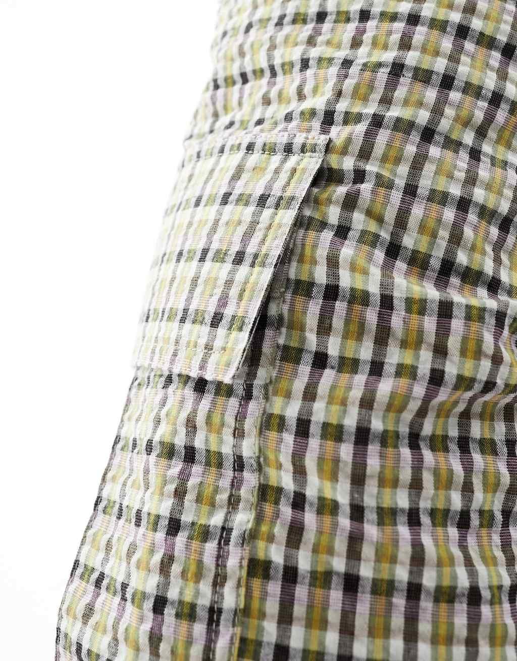 ASOS DESIGN fit cargo shorts in textured plaid print Product Image