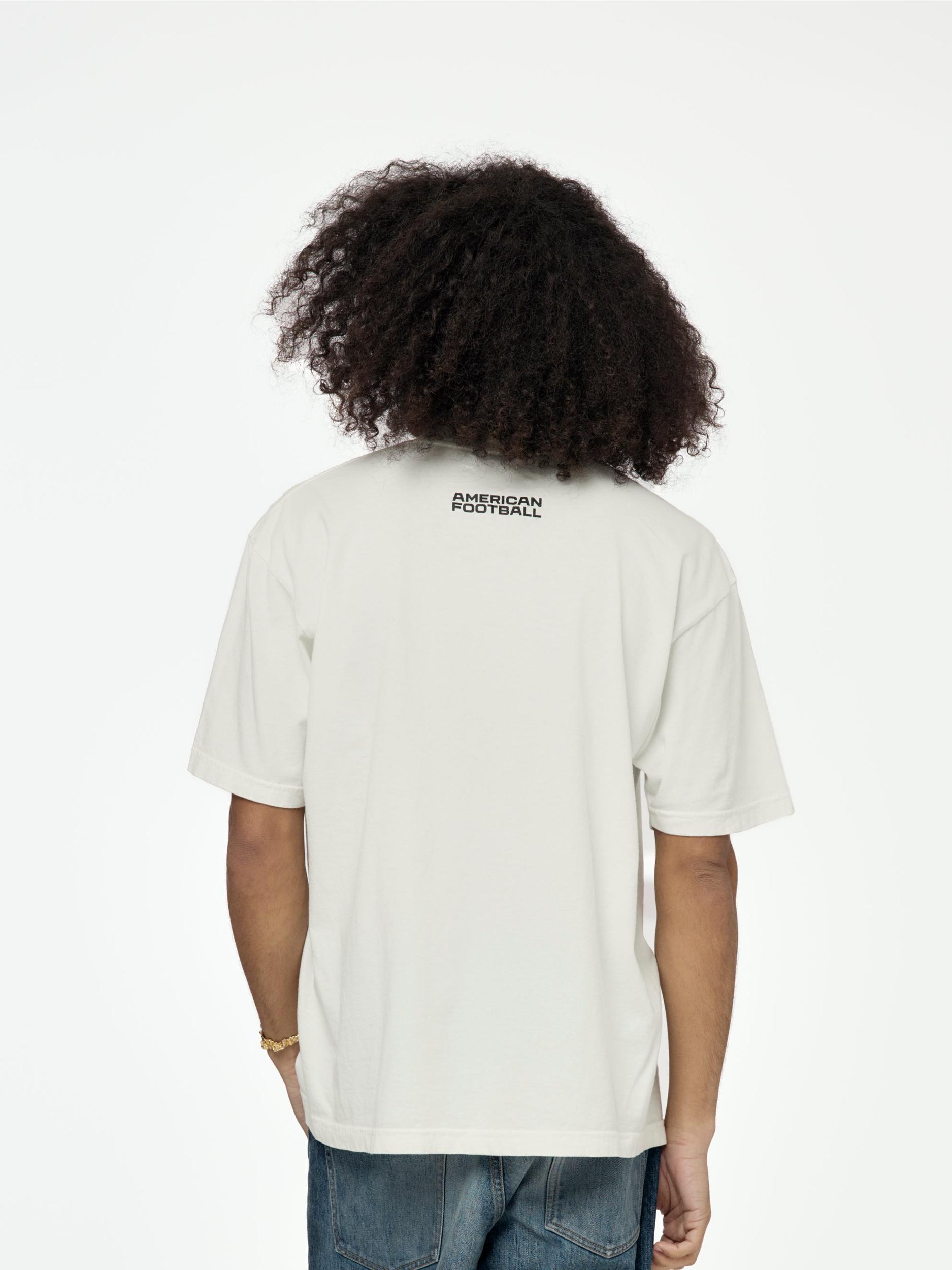 This is a Football Tee (Off White) Product Image
