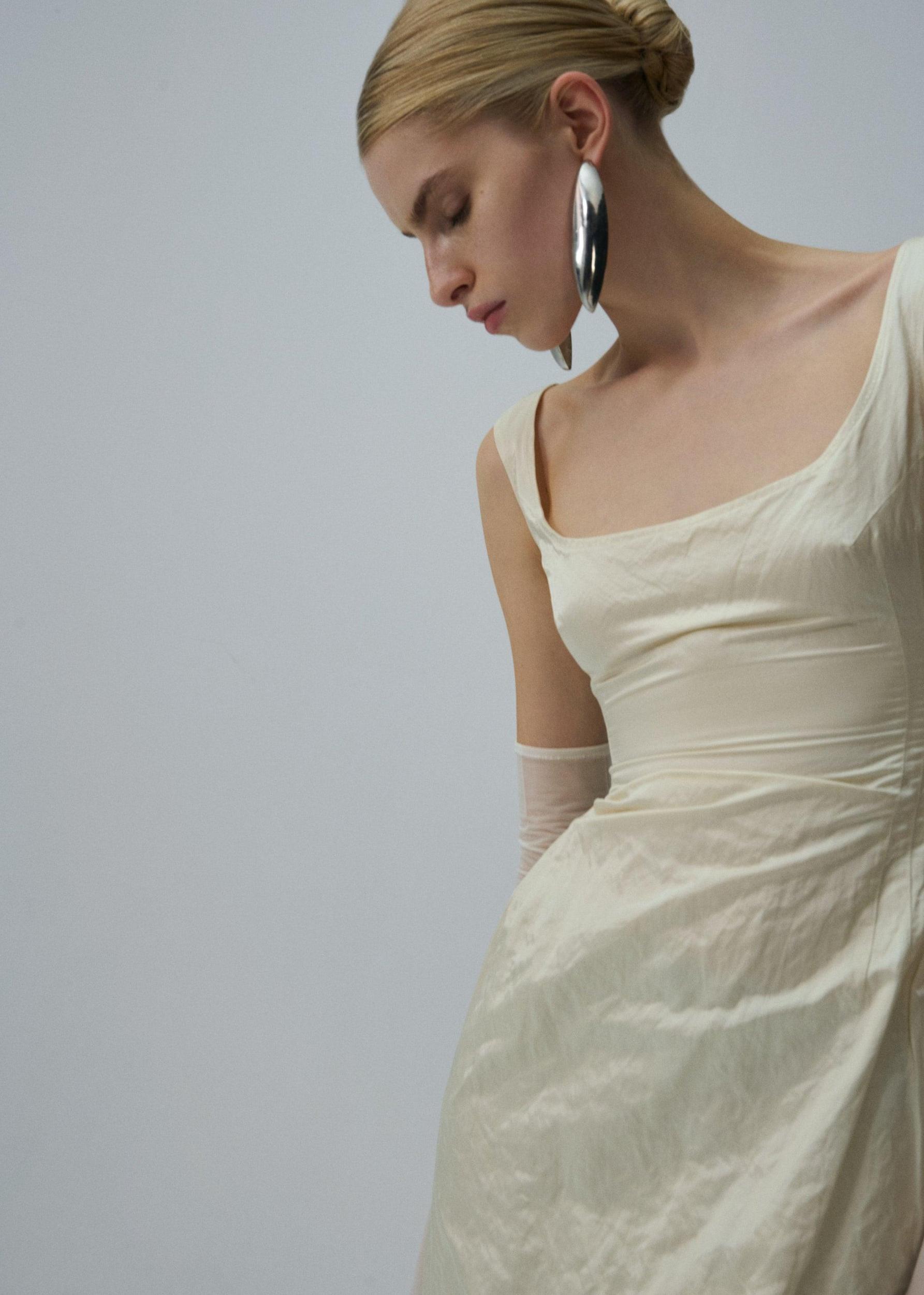 Round neck midi dress in cream Product Image