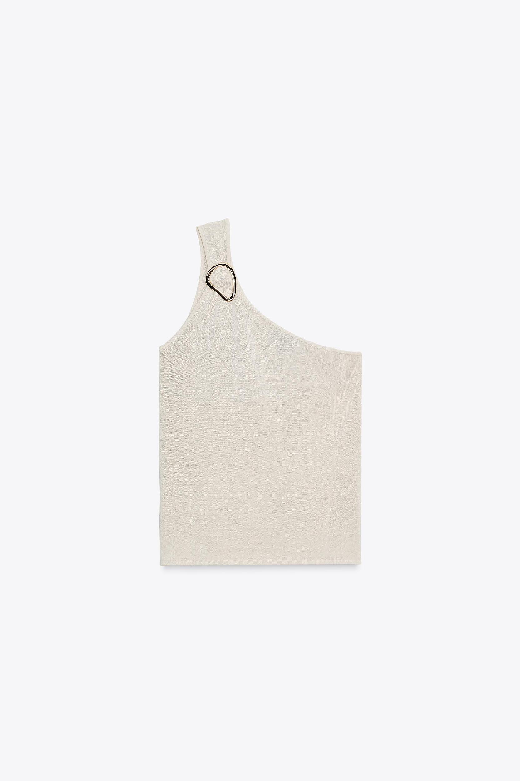 ASYMMETRIC KNIT TOP WITH HARDWARE Product Image