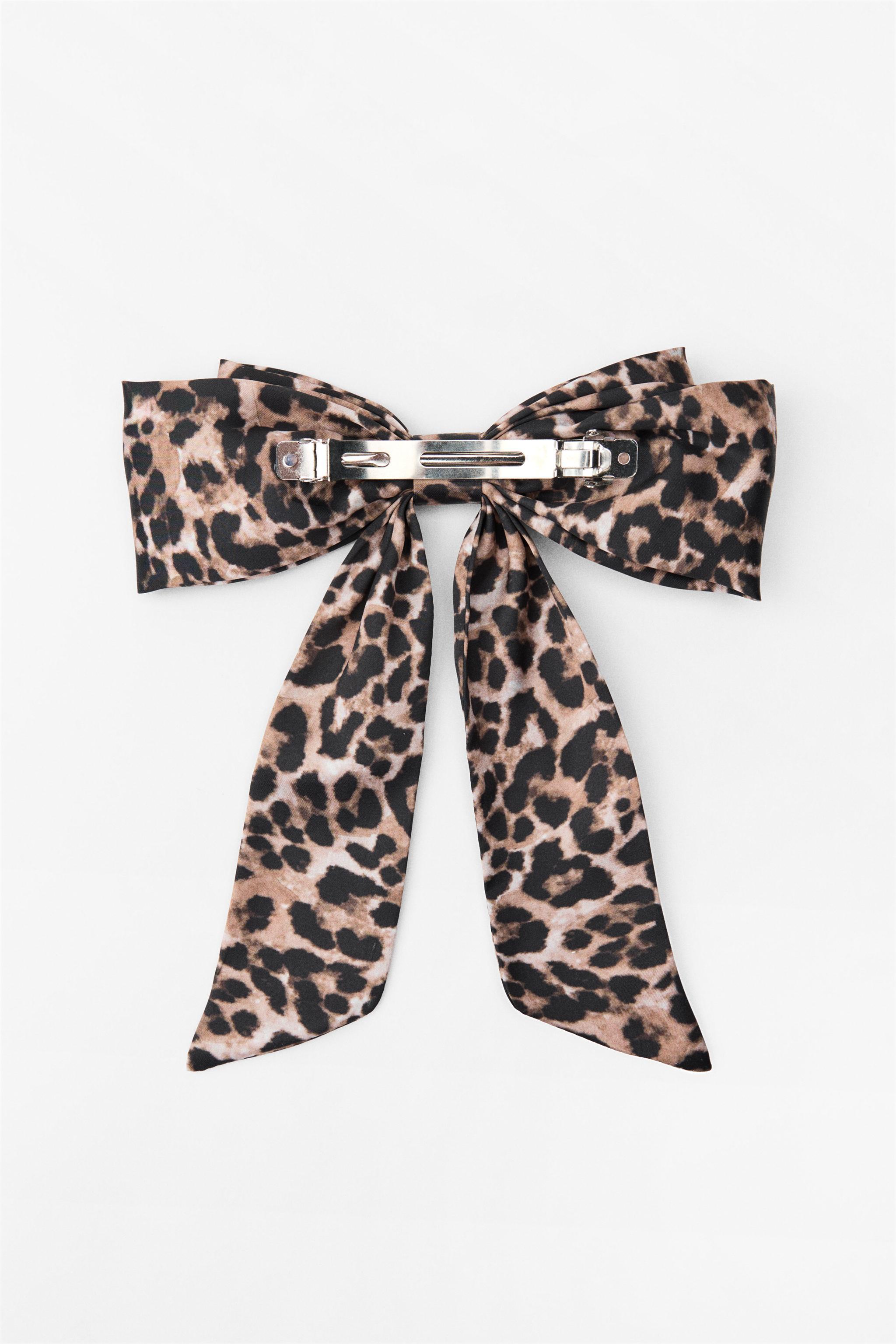 ANIMAL PRINT SATIN EFFECT BOW HAIR CLIP Product Image