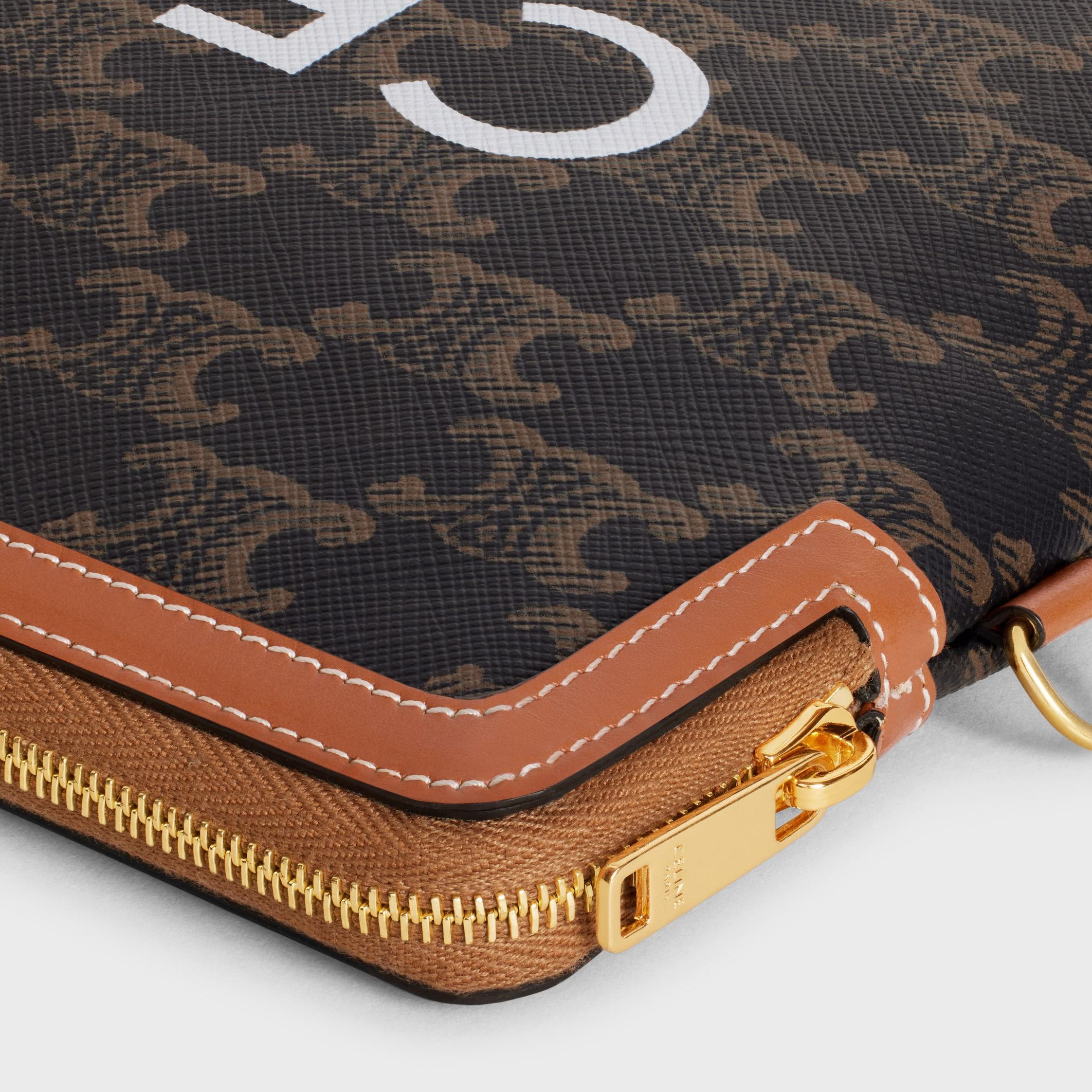 SMALL POUCH WITH STRAP CUIR TRIOMPHE IN TRIOMPHE CANVAS WITH CELINE PRINT Product Image