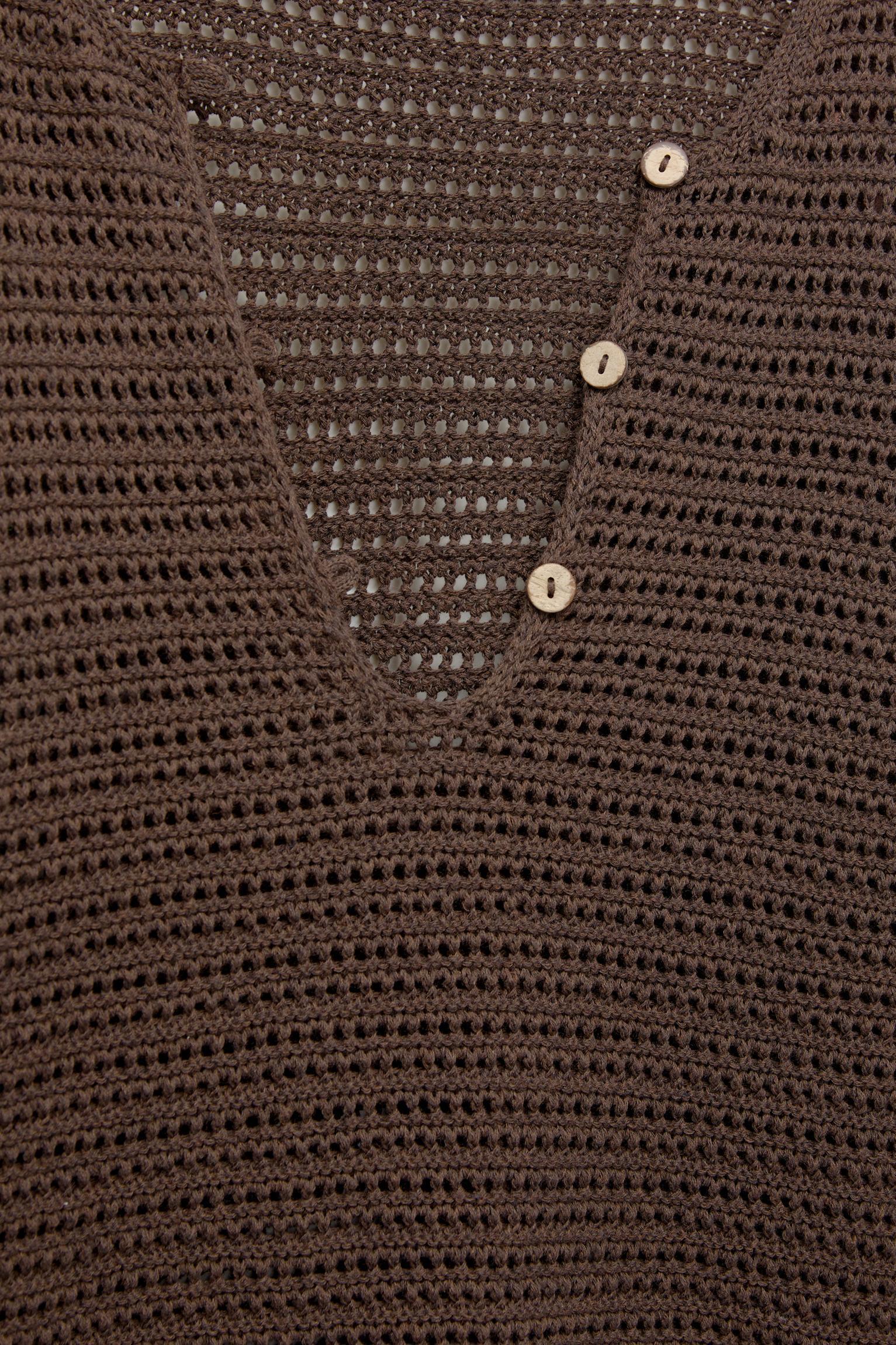 Open knit sweater with buttons Product Image