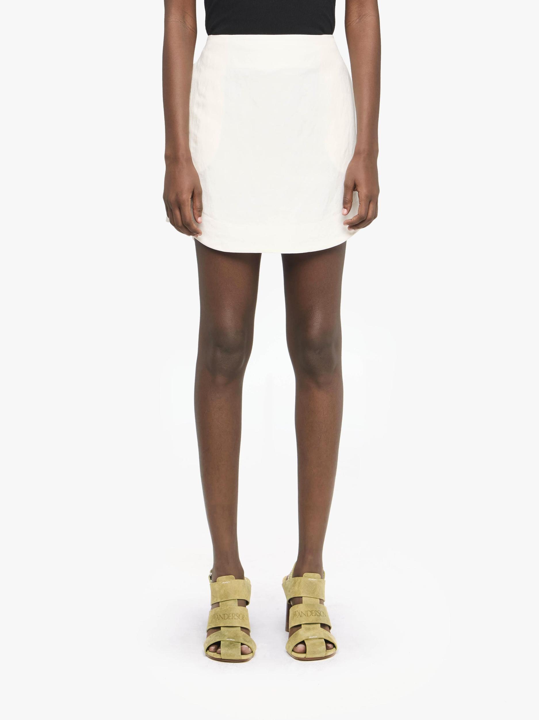 CURVED HEM MINI SKIRT Product Image