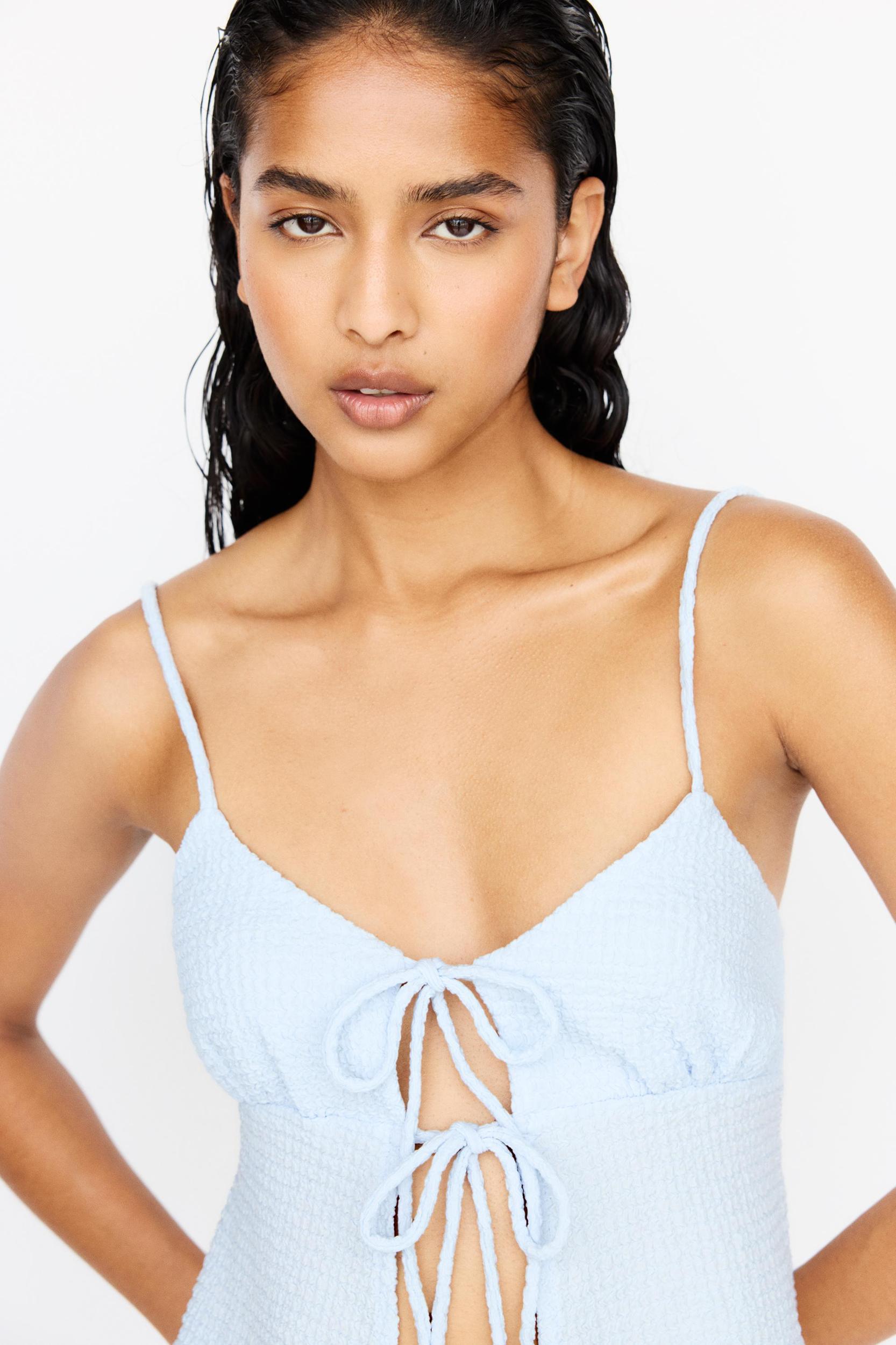 Creased-effect top with bows Product Image