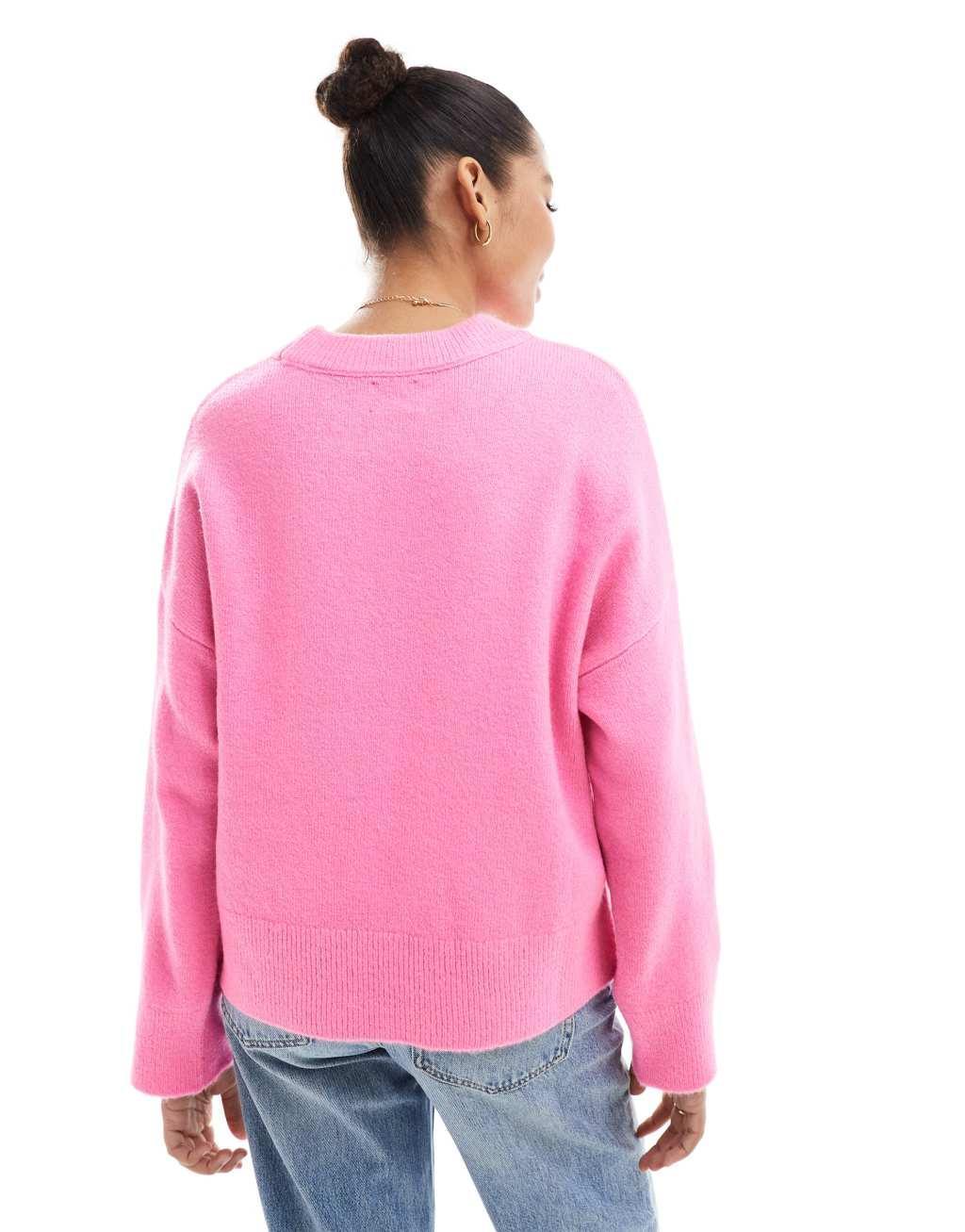 ASOS DESIGN boxy crew neck sweater in pink Product Image