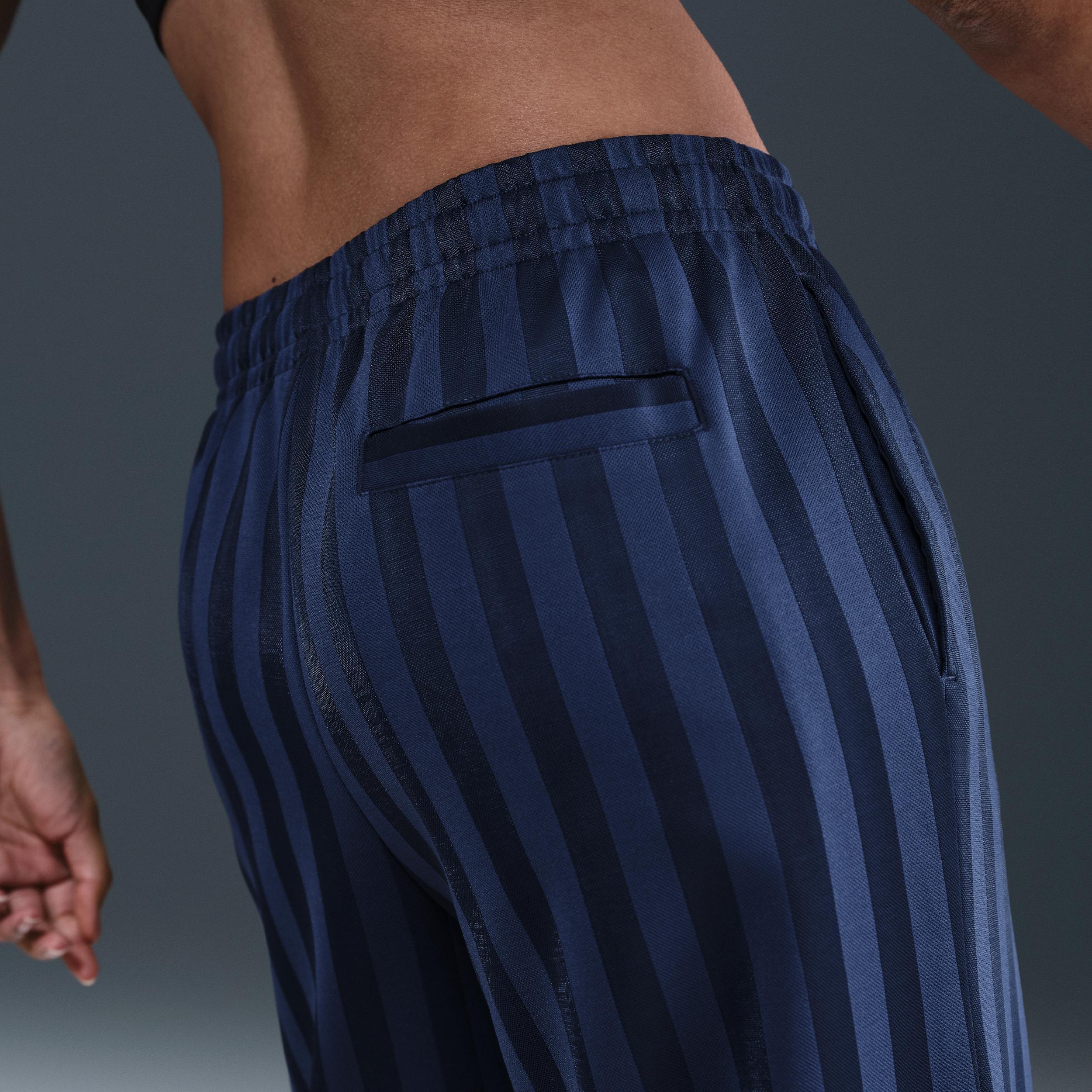 Womens Nike Sportswear Mid-Rise Loose Jacquard Striped Track Pants | HV5133-110 Product Image