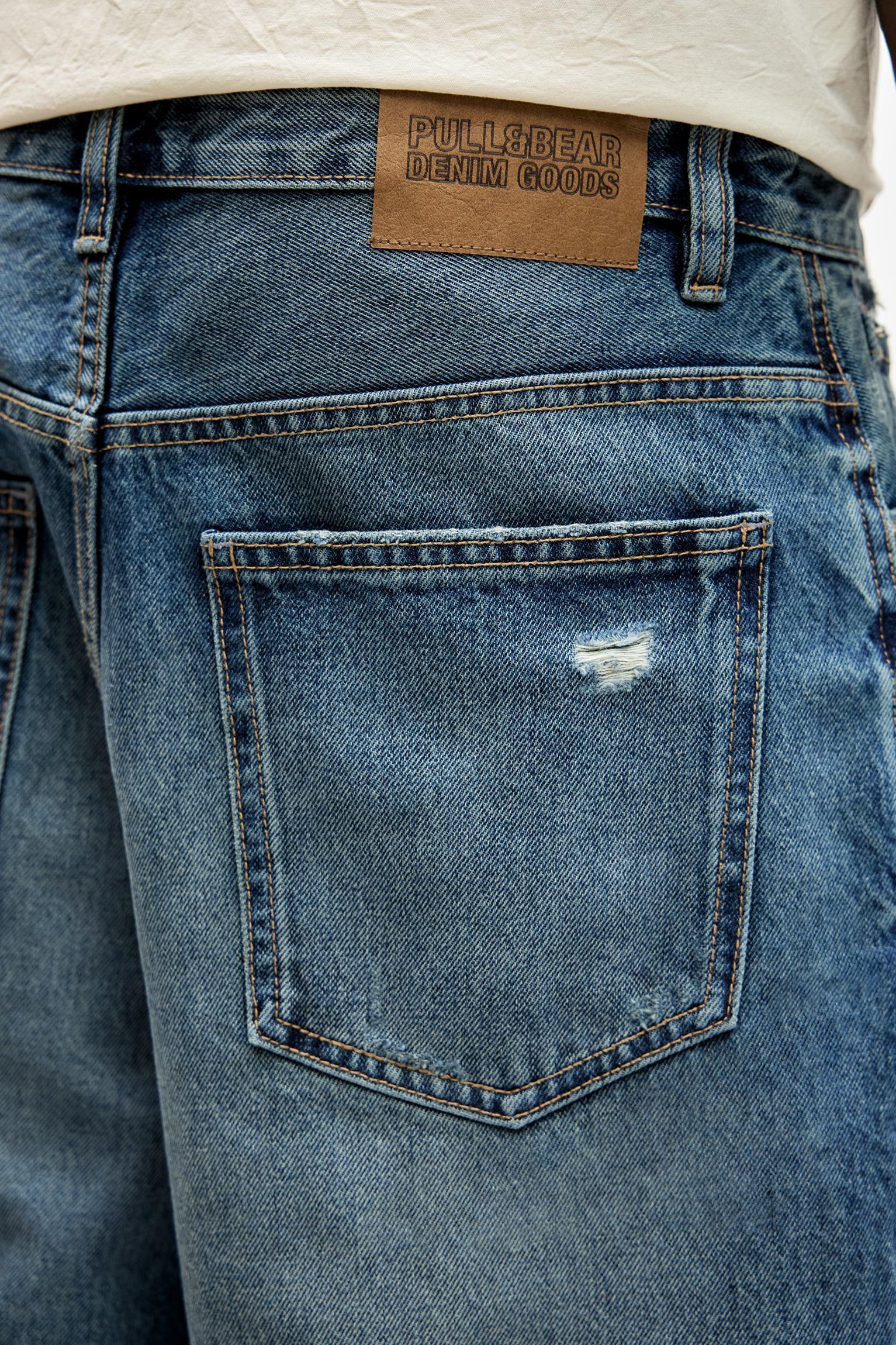 Ripped straight fit denim Bermuda shorts Product Image