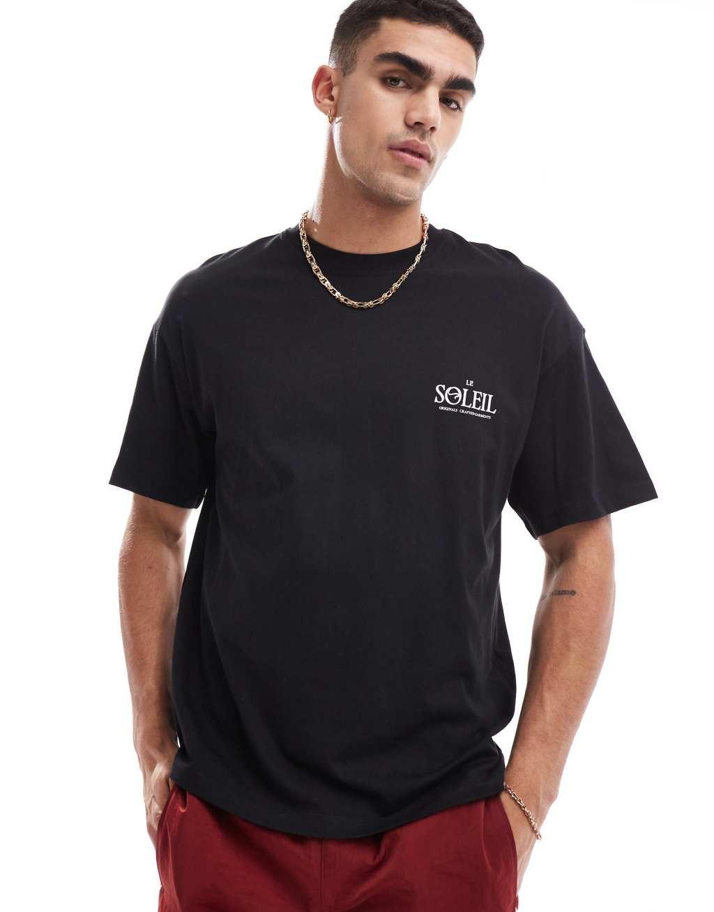 Jack & Jones oversized T-shirt with Le Soleil art back print in black Product Image